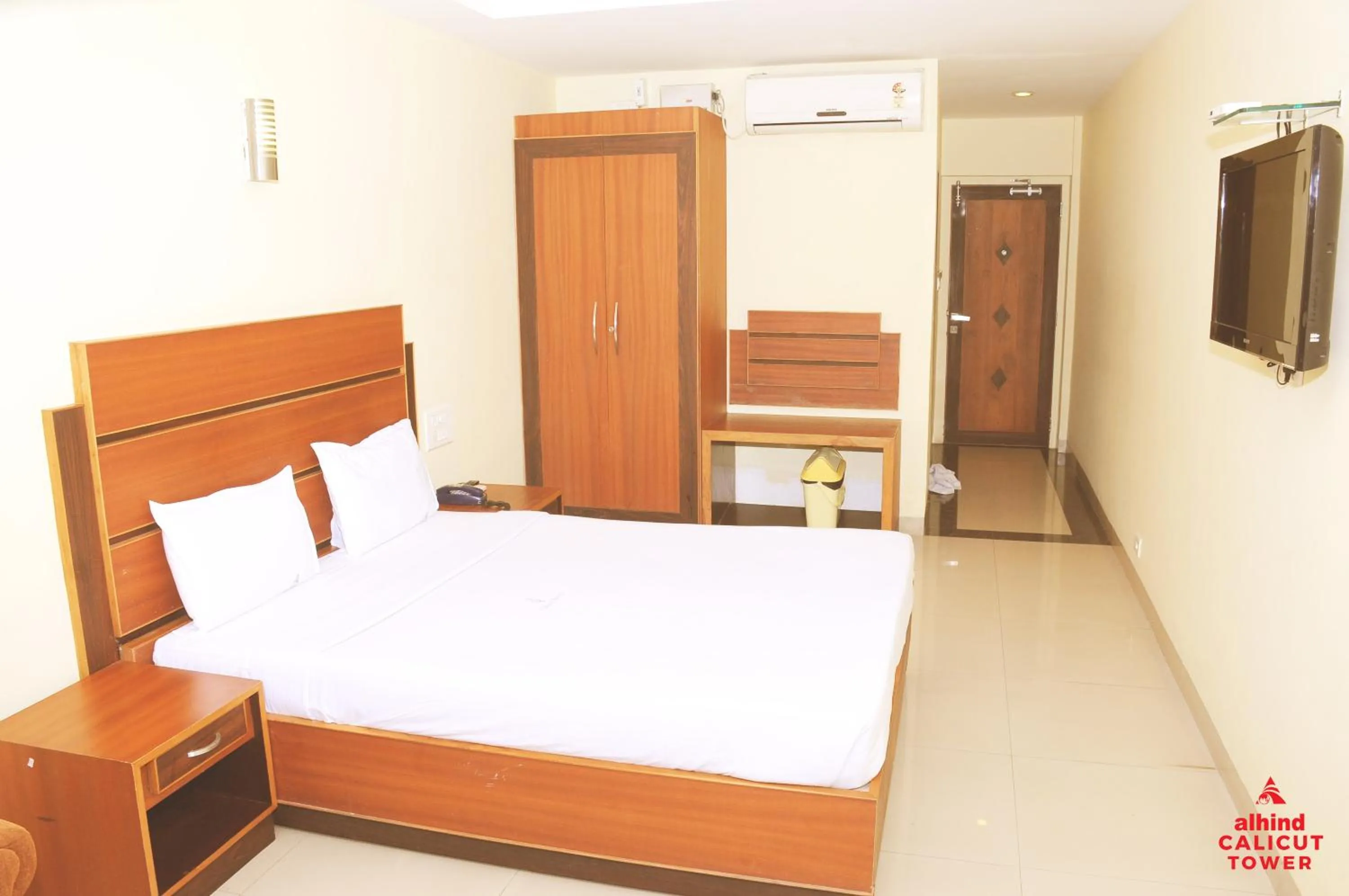 Bed in Alhind Calicut Tower