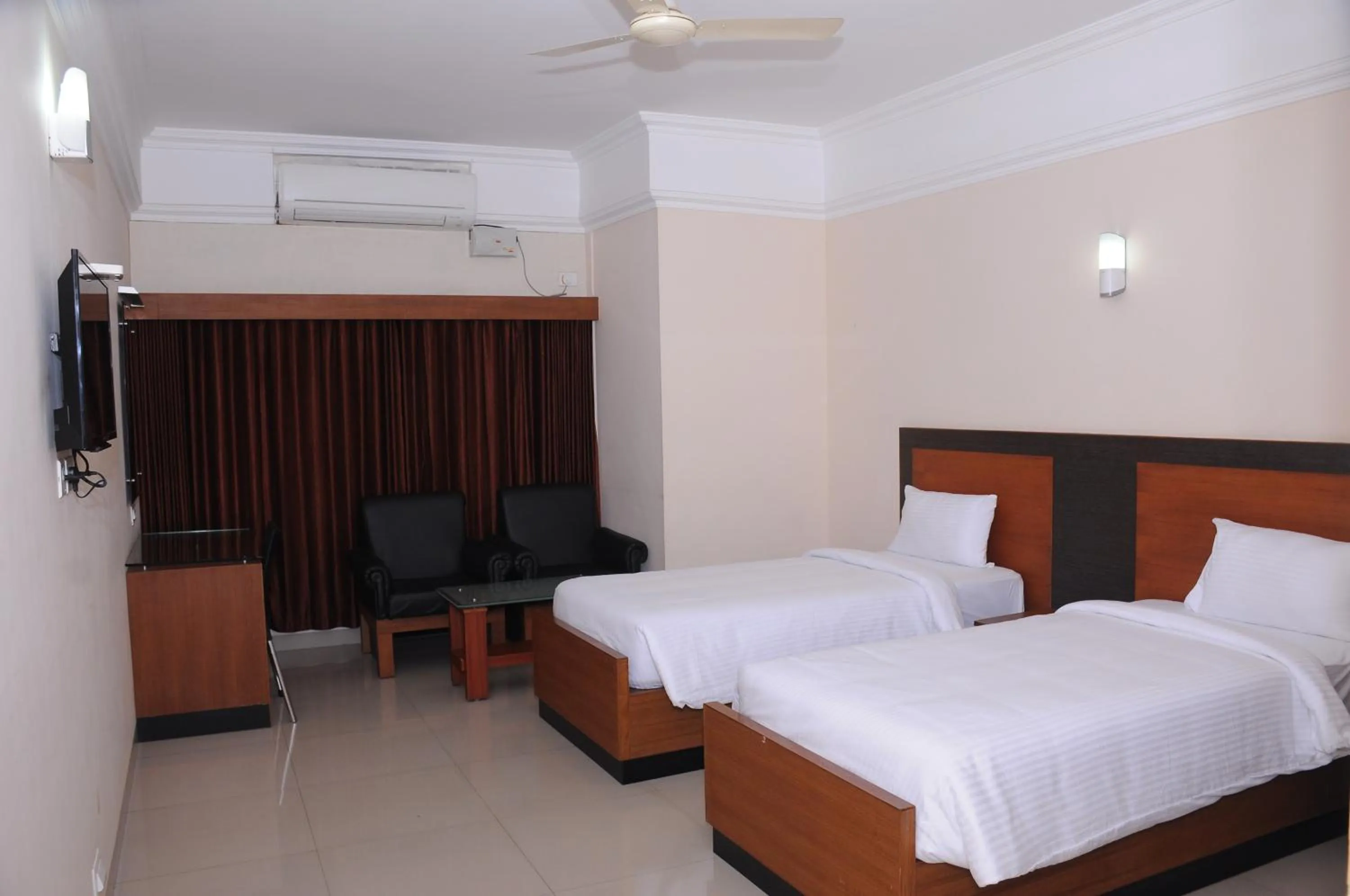 Bed in Alhind Calicut Tower