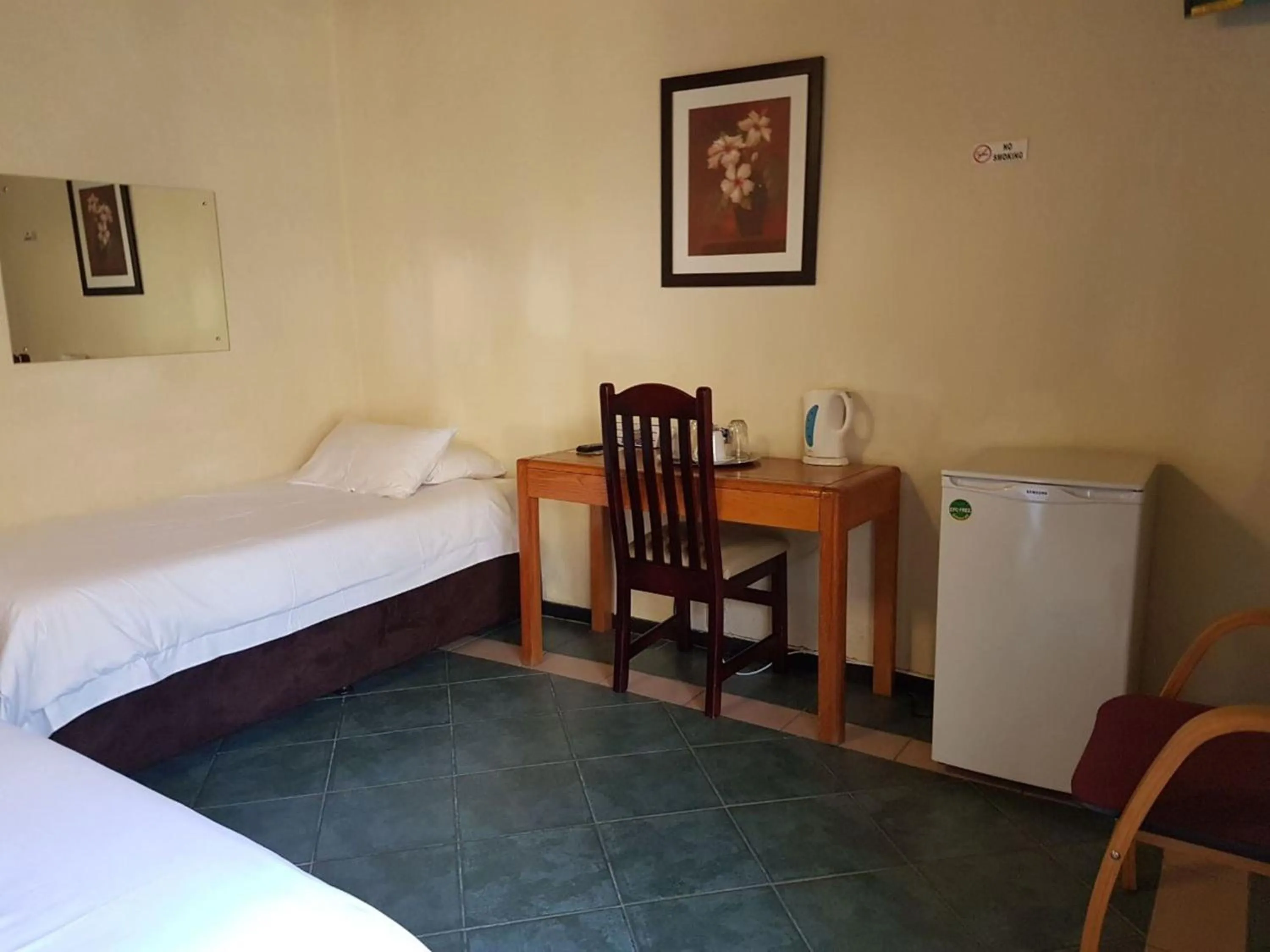 Bed in Marlot Guest House