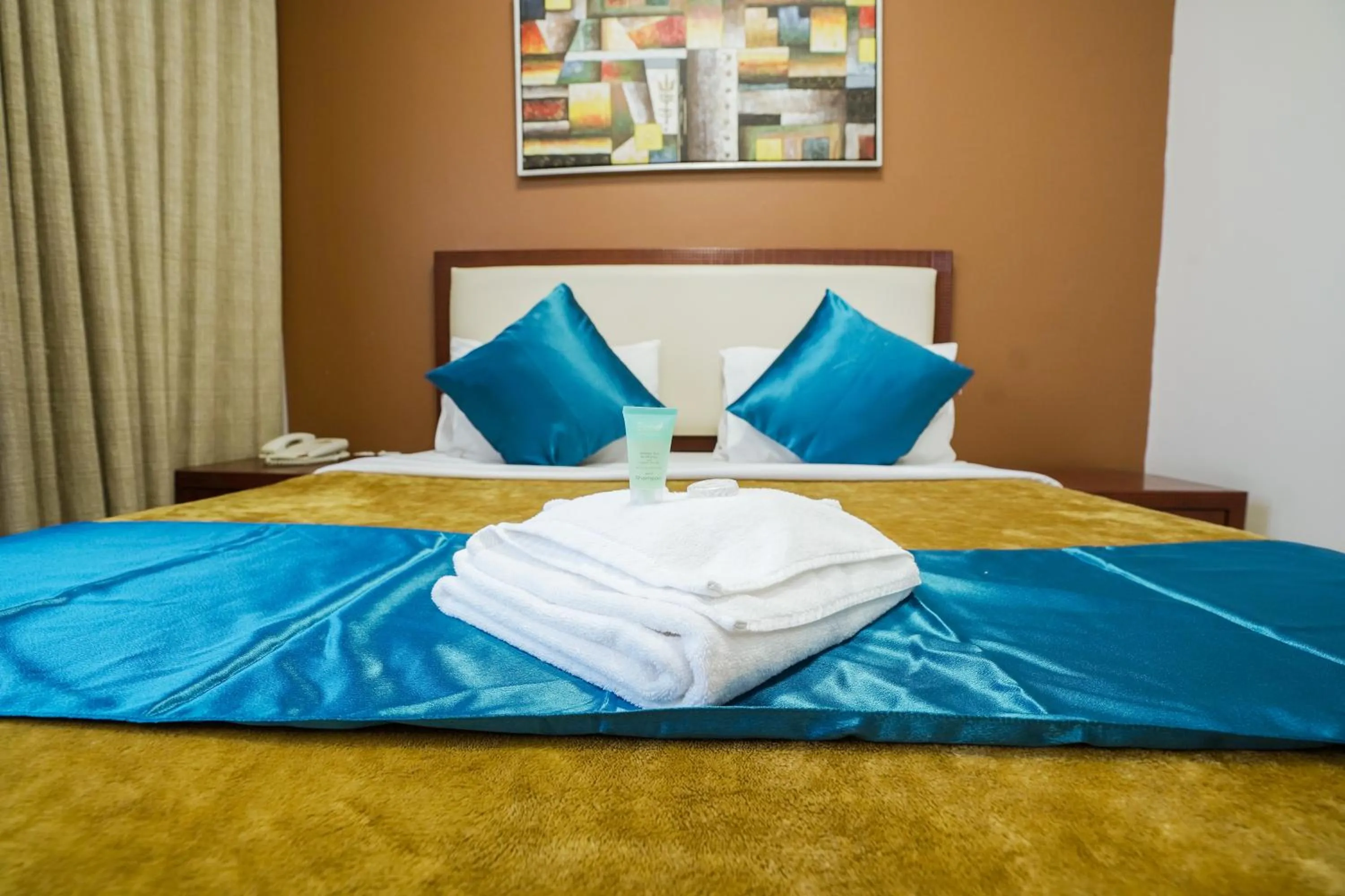 Bed in Crystal Plaza Hotel