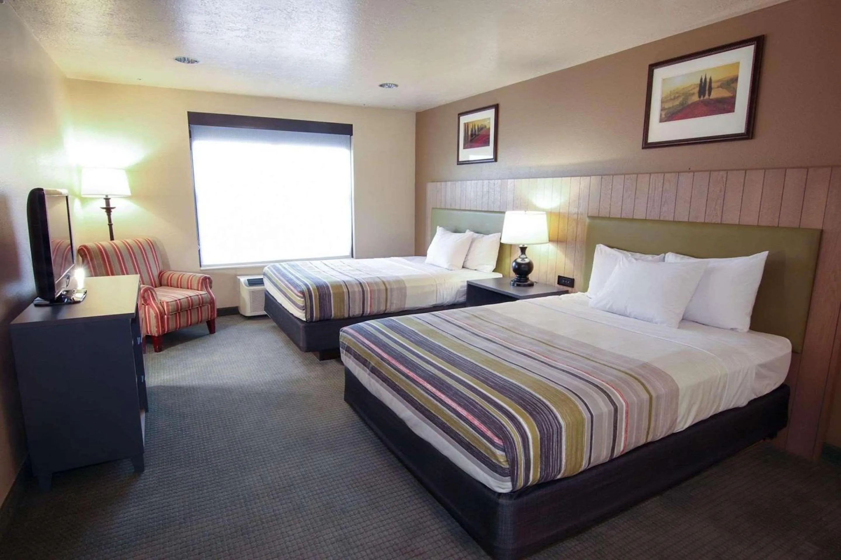 Bedroom in Country Inn & Suites by Radisson, West Valley City, UT
