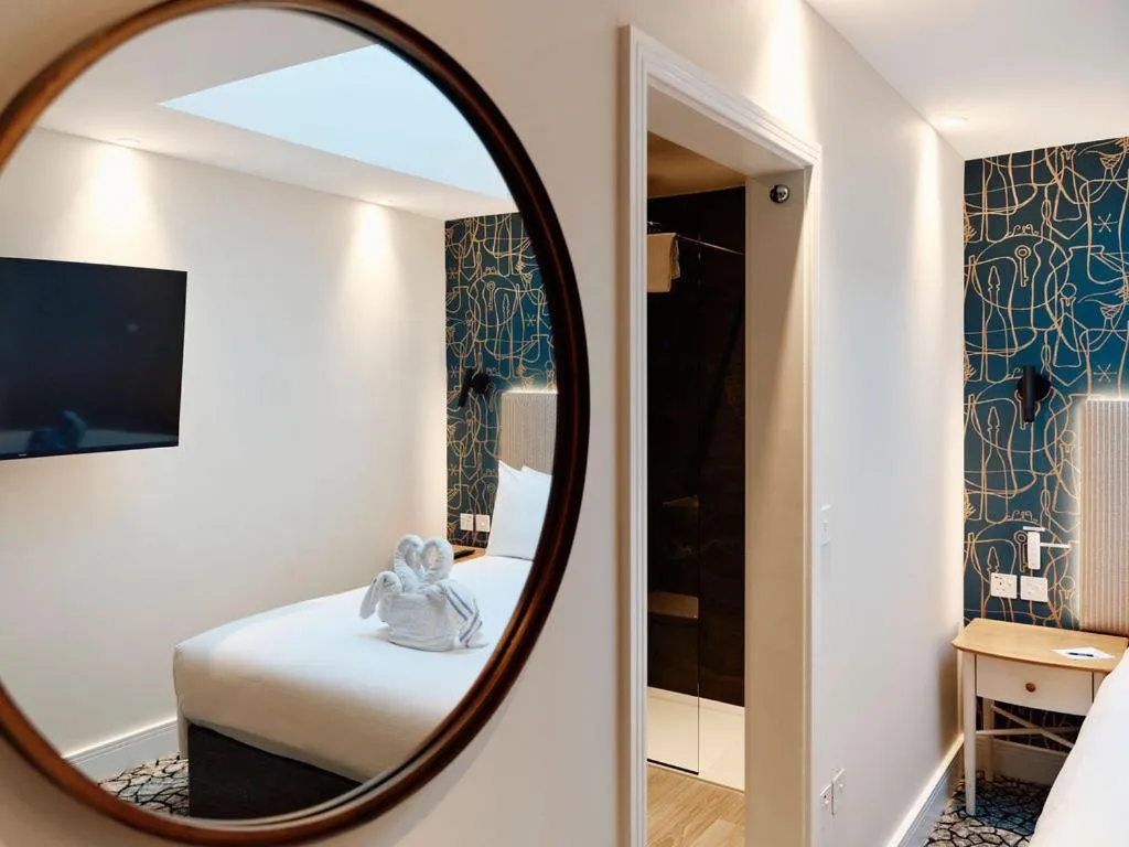 Decorative detail, Bed in Hotel De Normandie