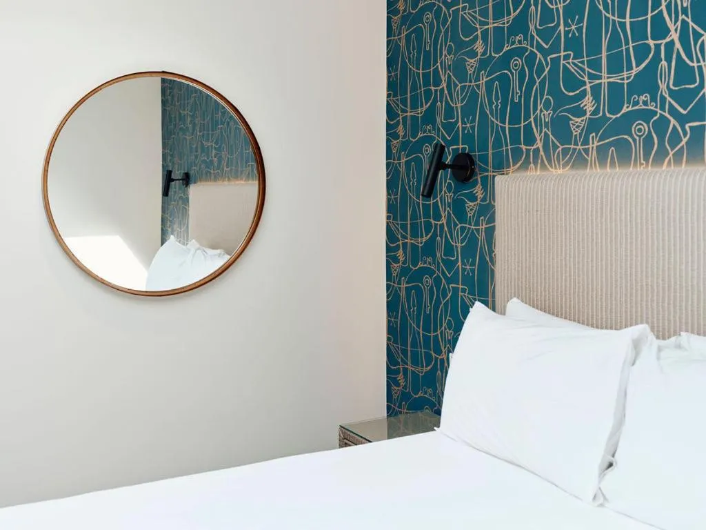 Decorative detail, Bed in Hotel De Normandie