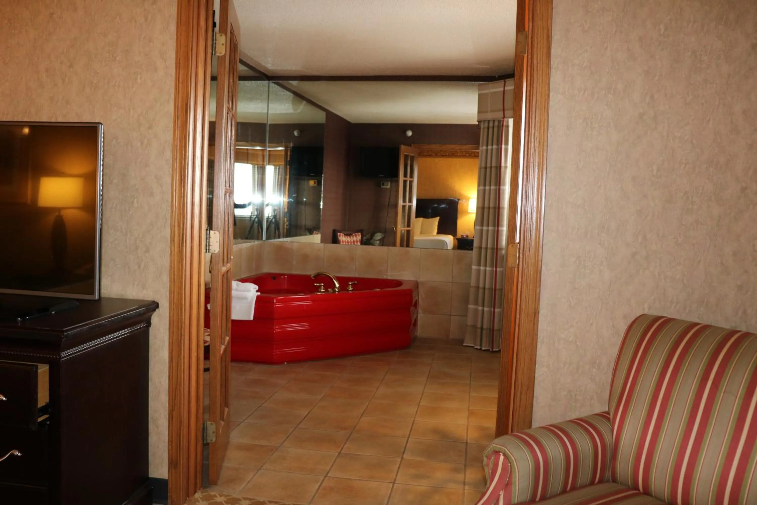 Living room in Country Inn & Suites by Radisson, Lincoln North Hotel and Conference Center, NE