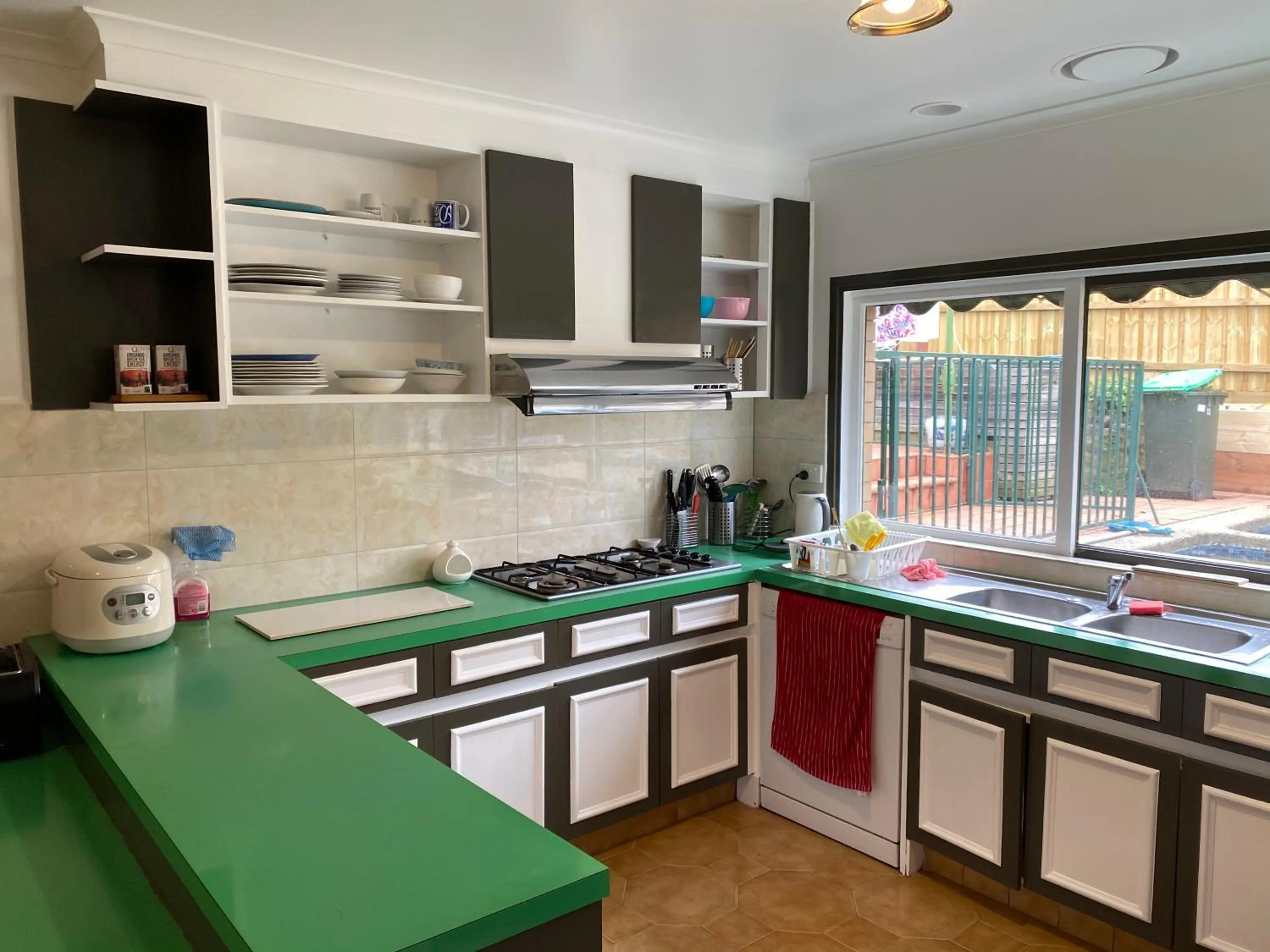 Communal kitchen in ADA Homestay