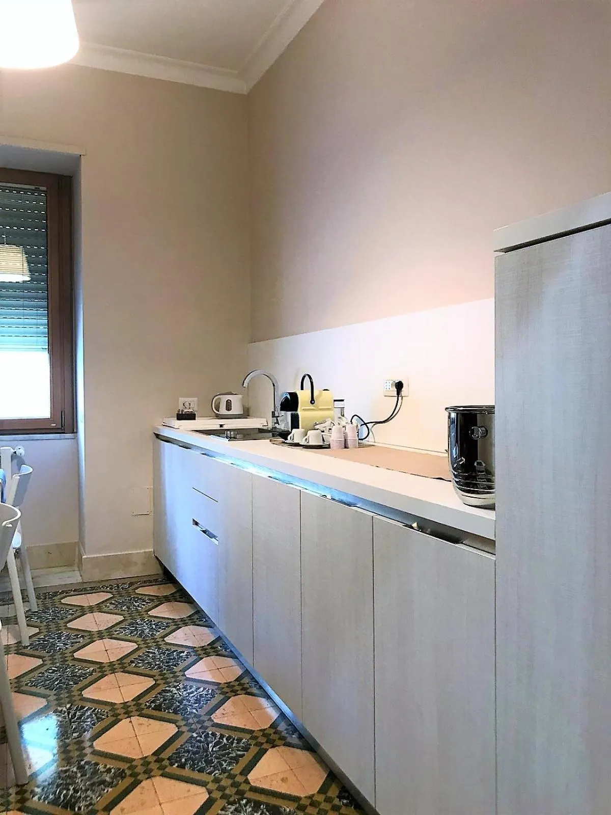 Kitchen or kitchenette in Casa Isabela luxury rooms