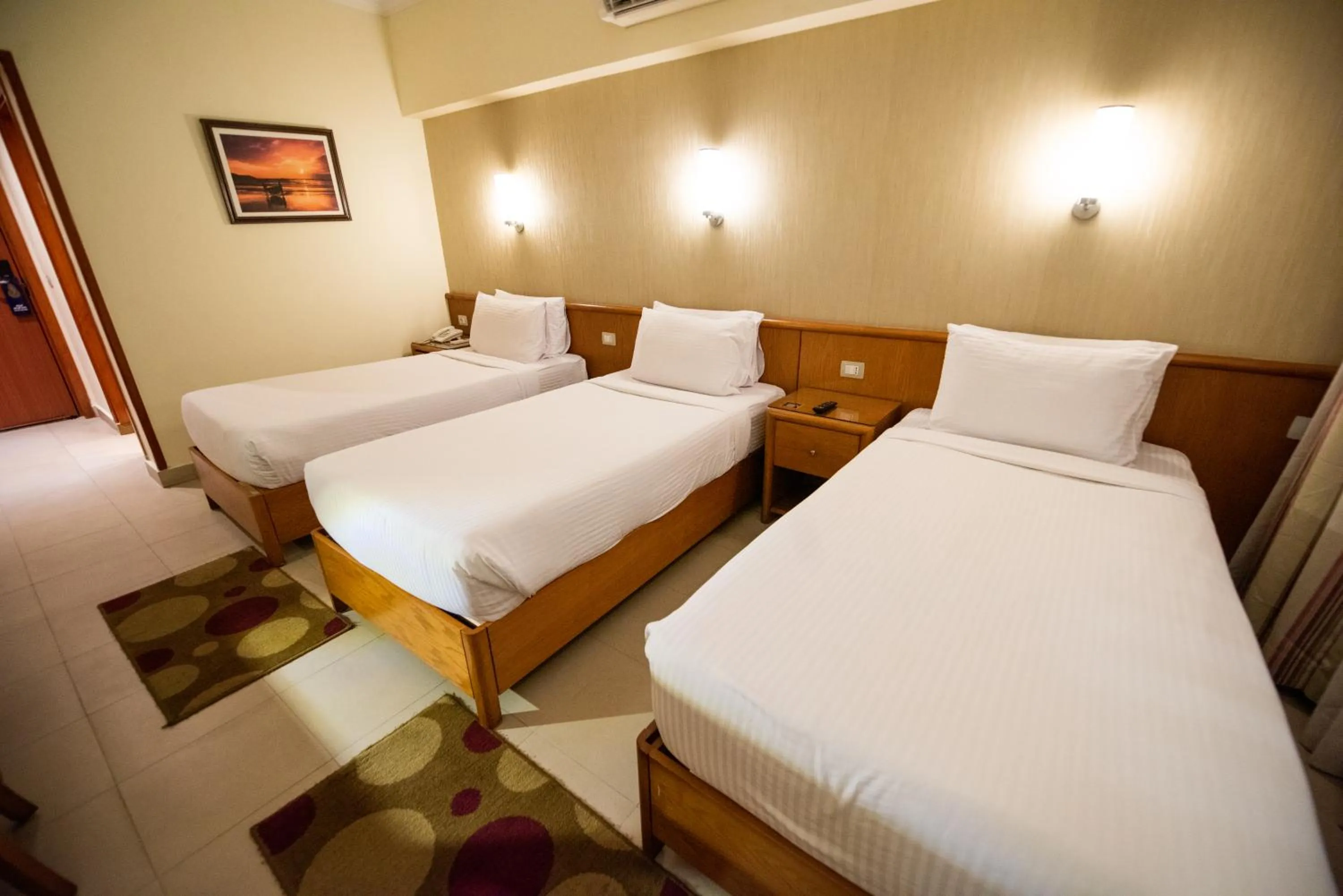 Bed in The Grand Plaza Hotel Smouha