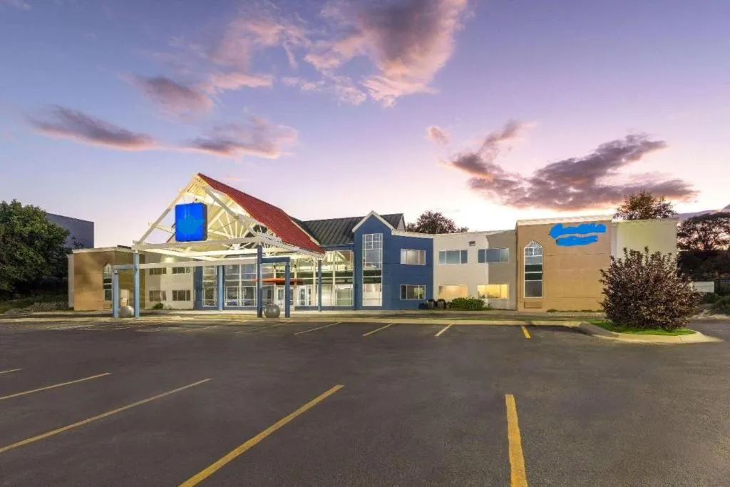 Property building in AmericInn by Wyndham Omaha Near Zoo