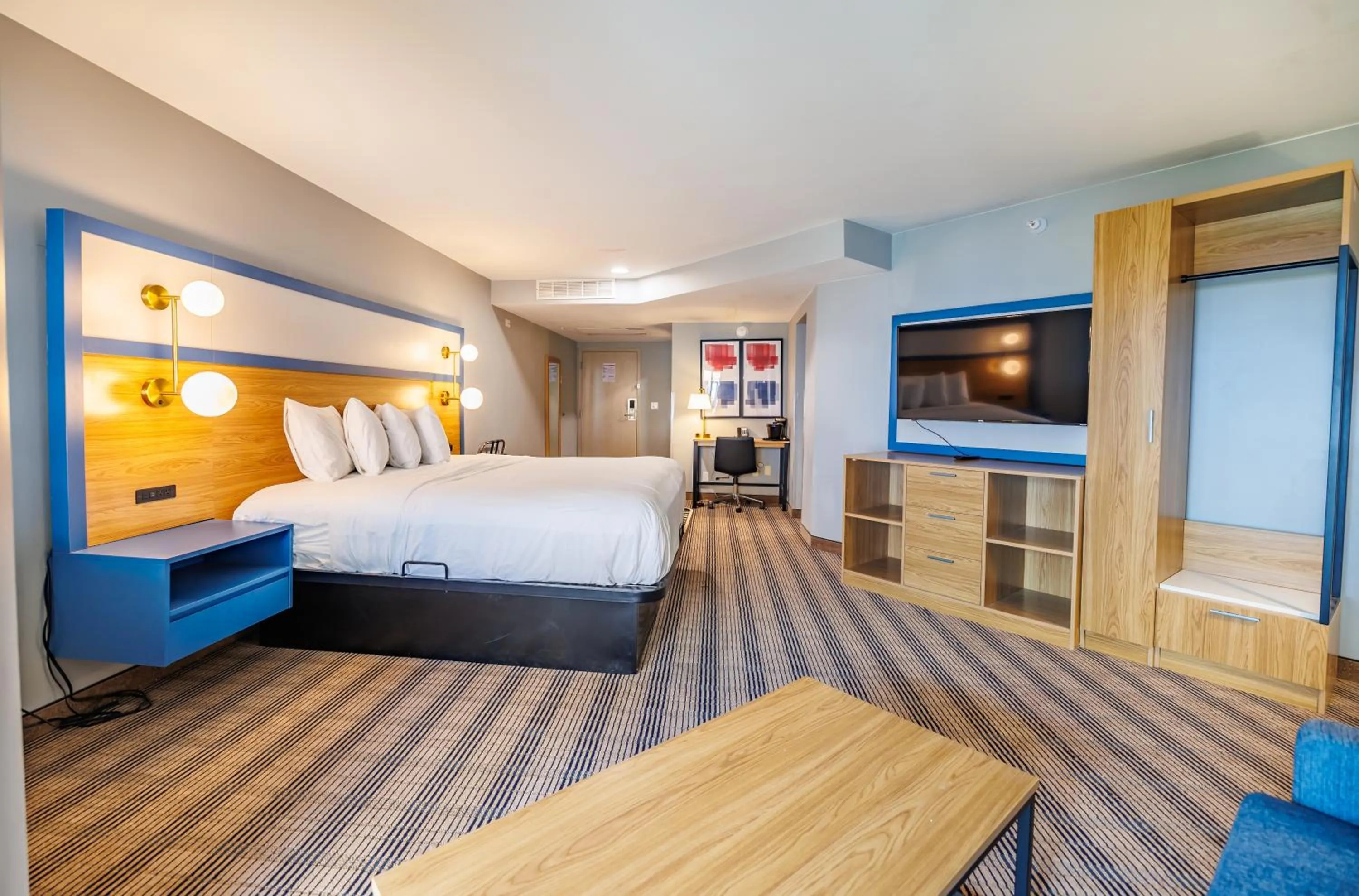 Bed in AmericInn by Wyndham Omaha Near Zoo