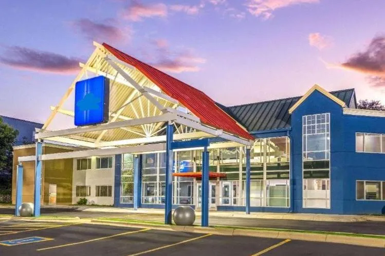 Property building in AmericInn by Wyndham Omaha Near Zoo