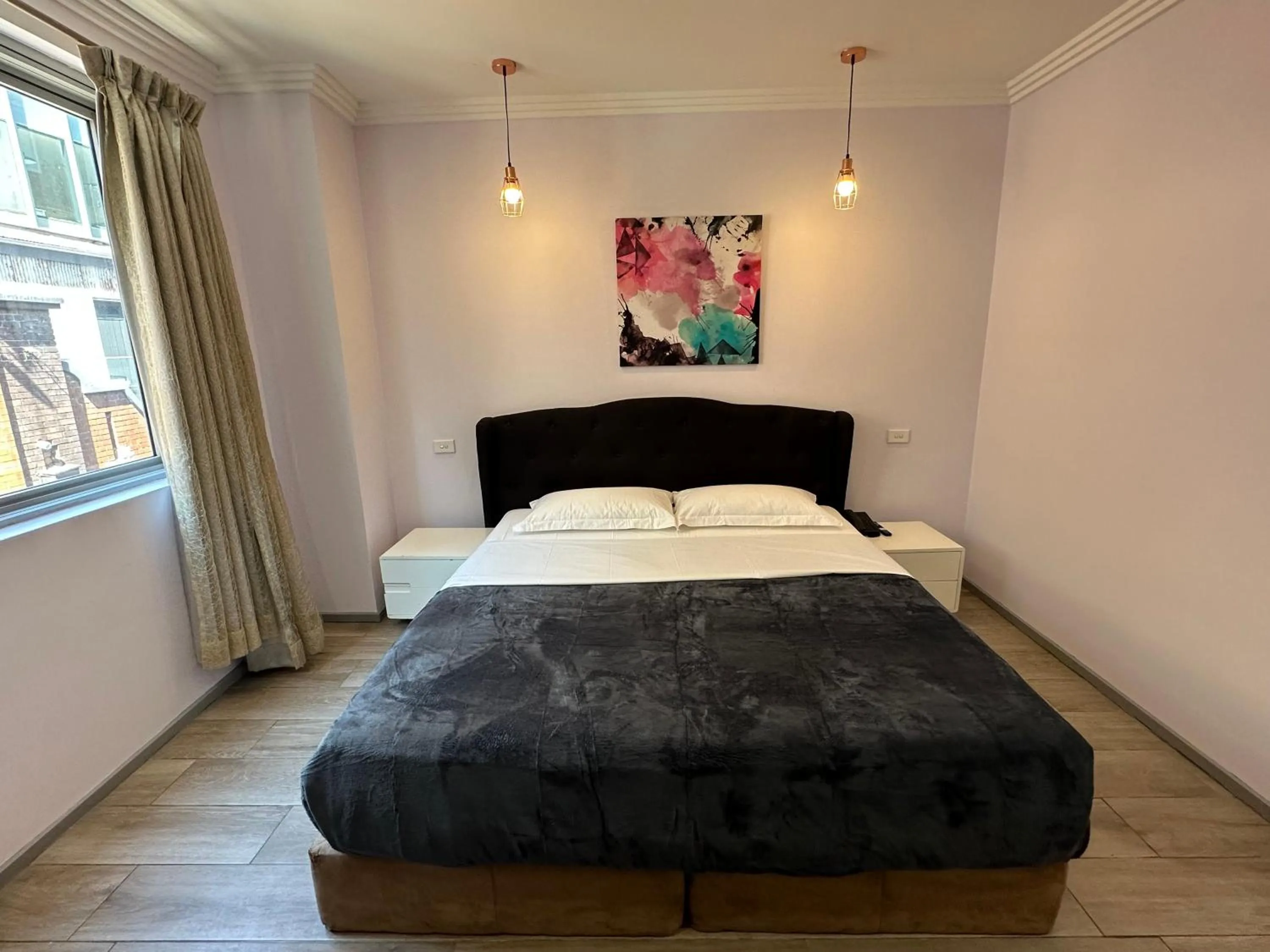 Bed in Sydney RiseOn Hotel