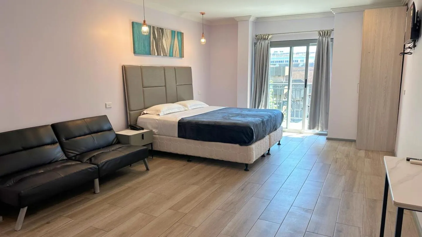 Photo of the whole room, Bed in Sydney RiseOn Hotel