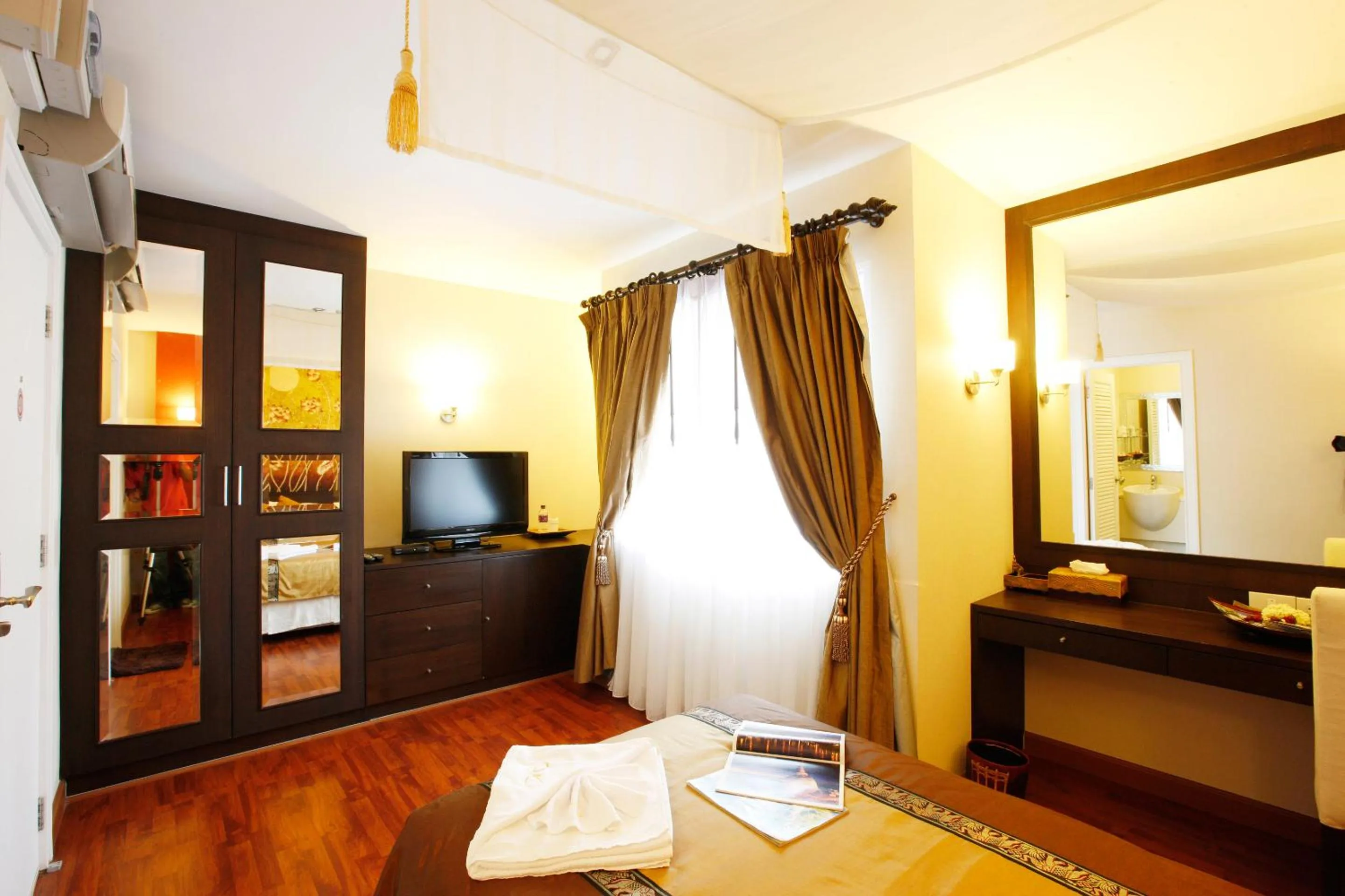 Photo of the whole room, Bed in Mirth Sathorn Hotel