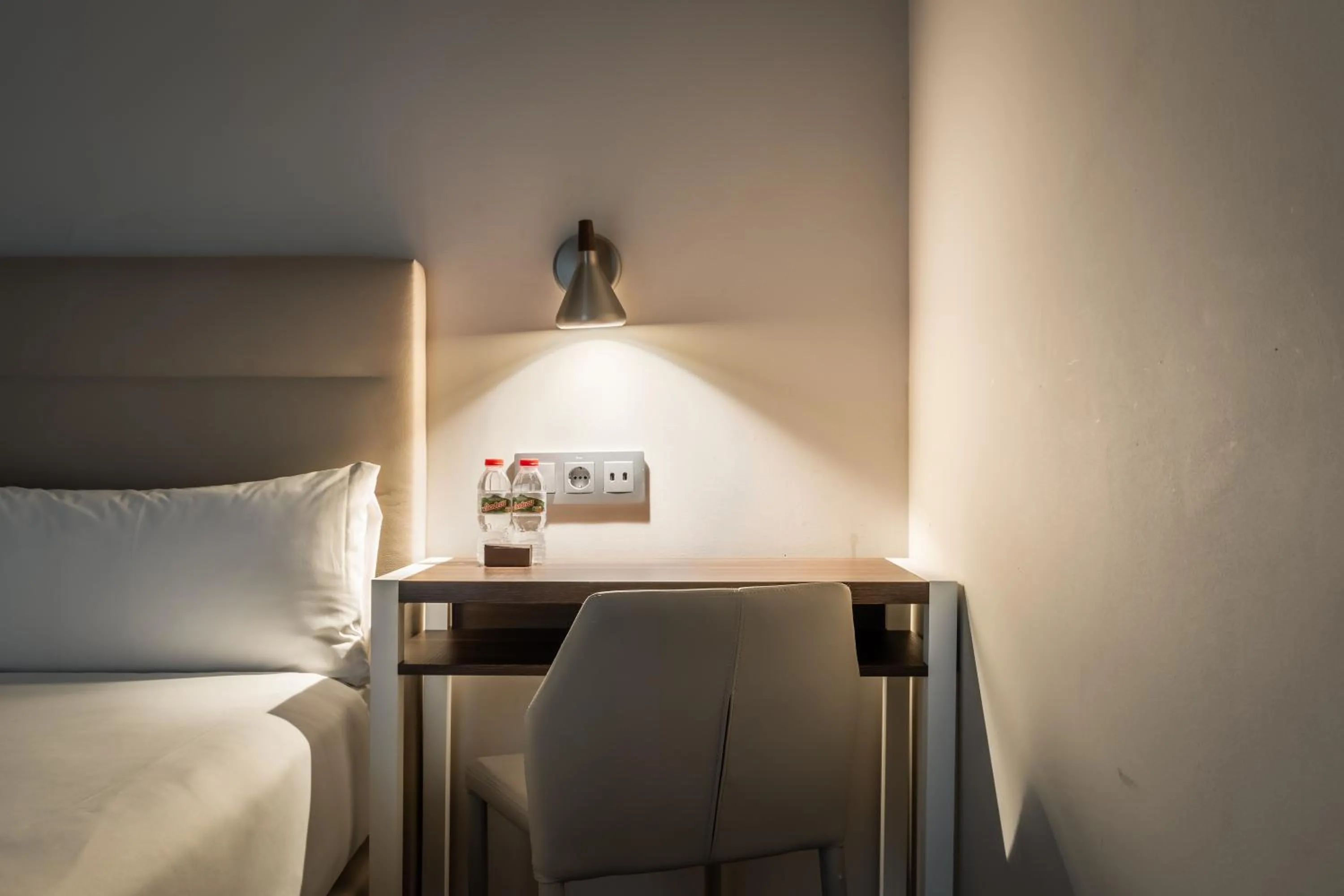 Bed in Arya Stadium Hotel