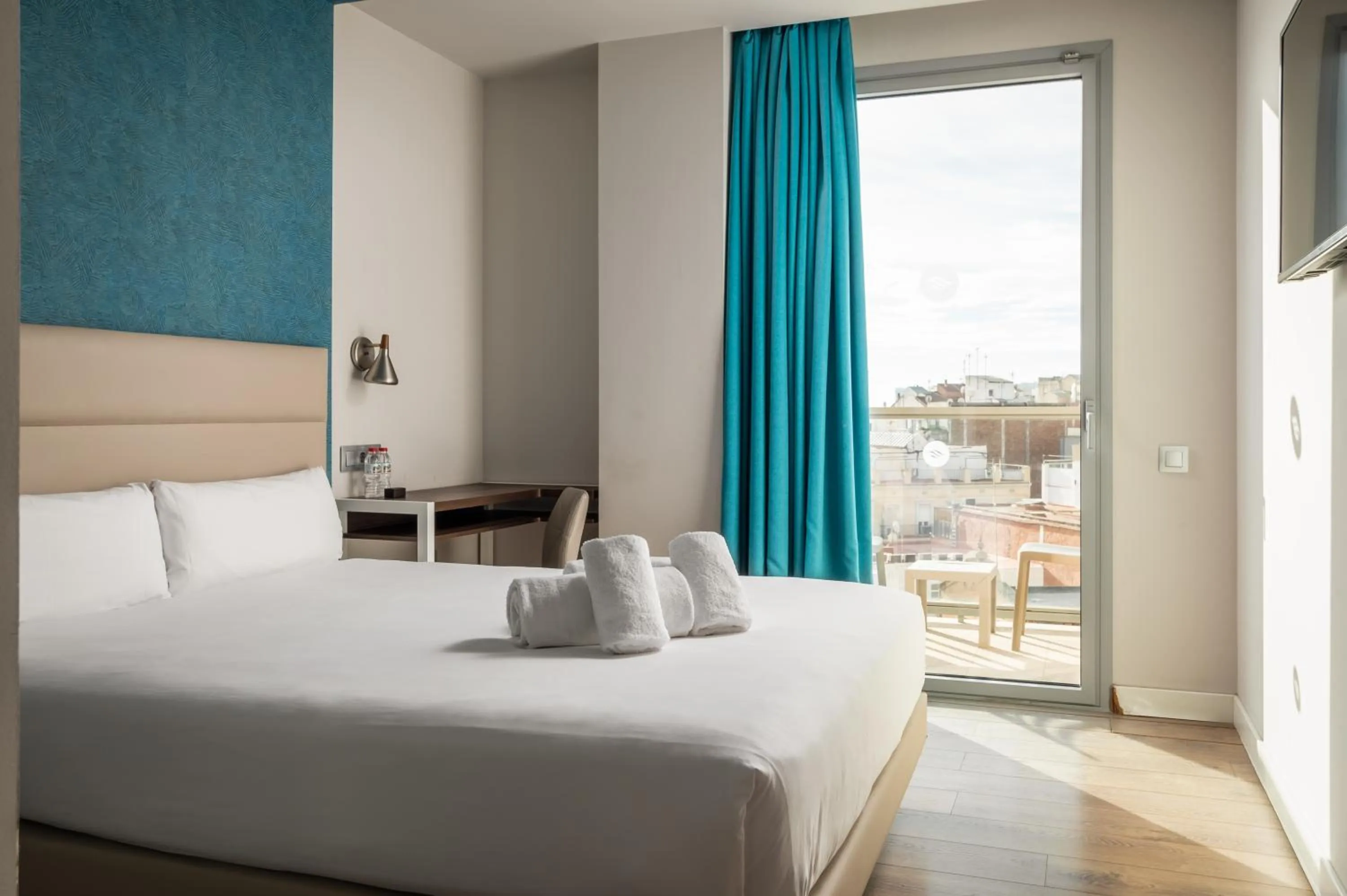 Bed in Arya Stadium Hotel