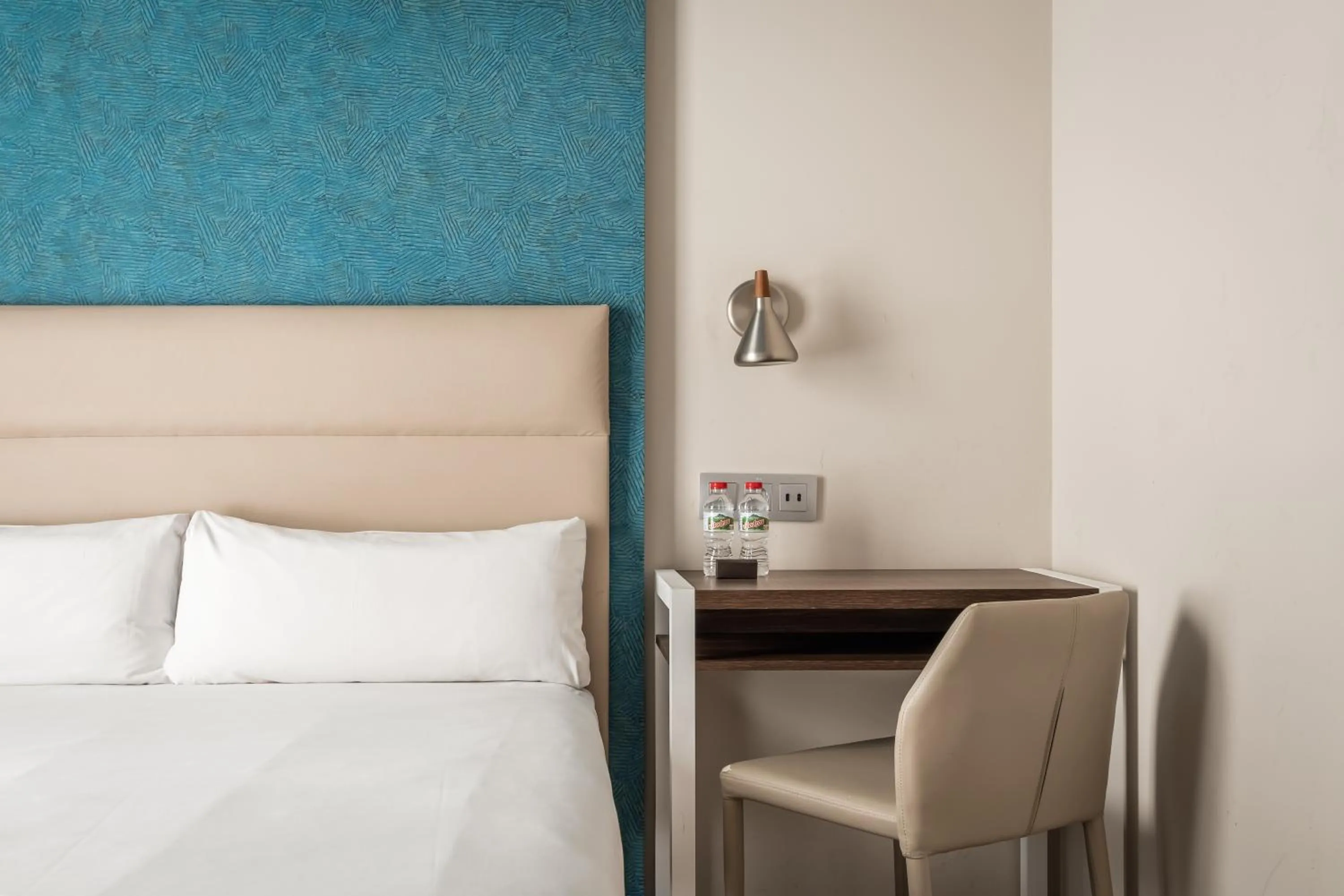 Bed in Arya Stadium Hotel