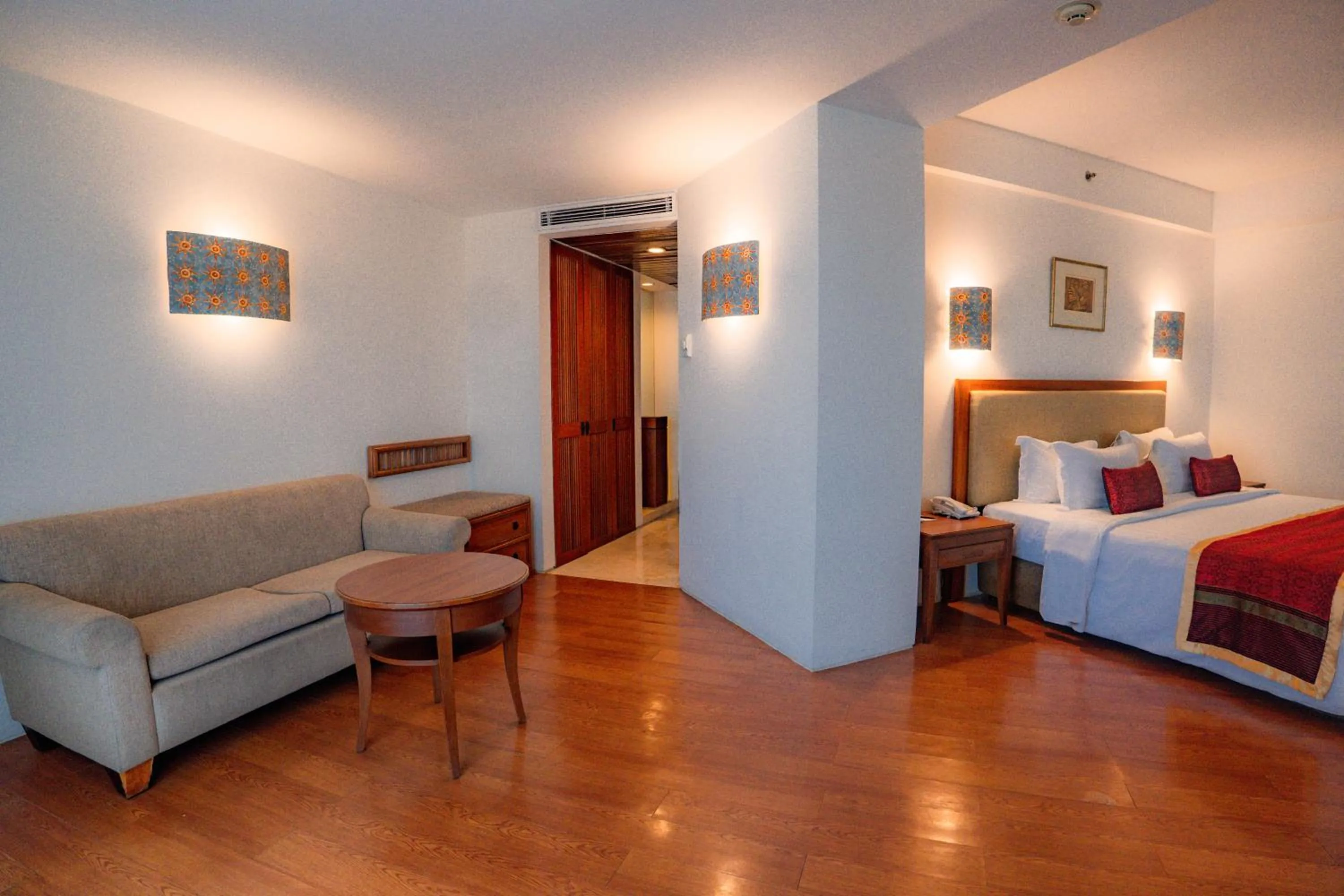 Seating area, Bed in Kuta Paradiso Hotel