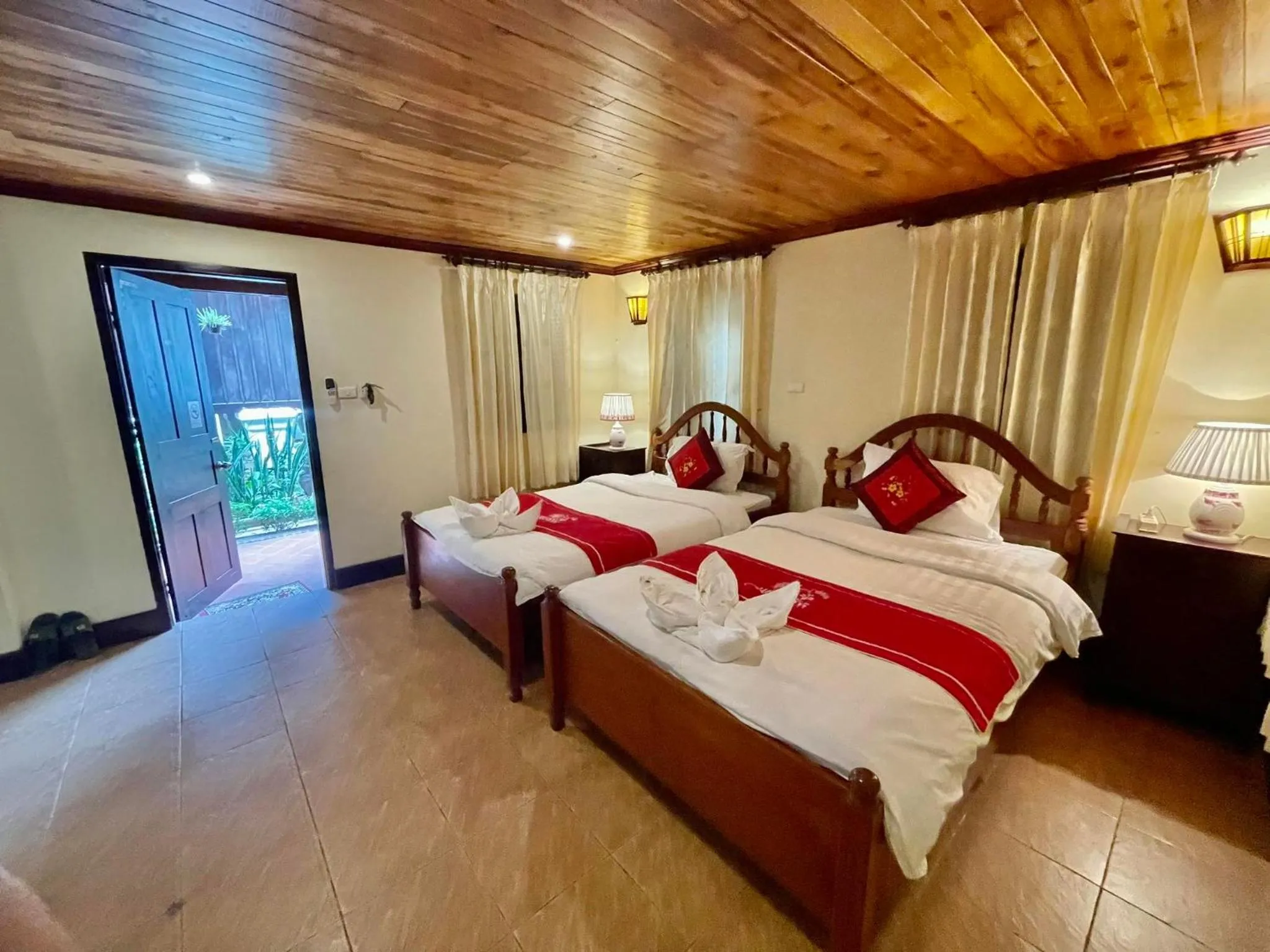 Bed in Villa Phathana Boutique Hotel