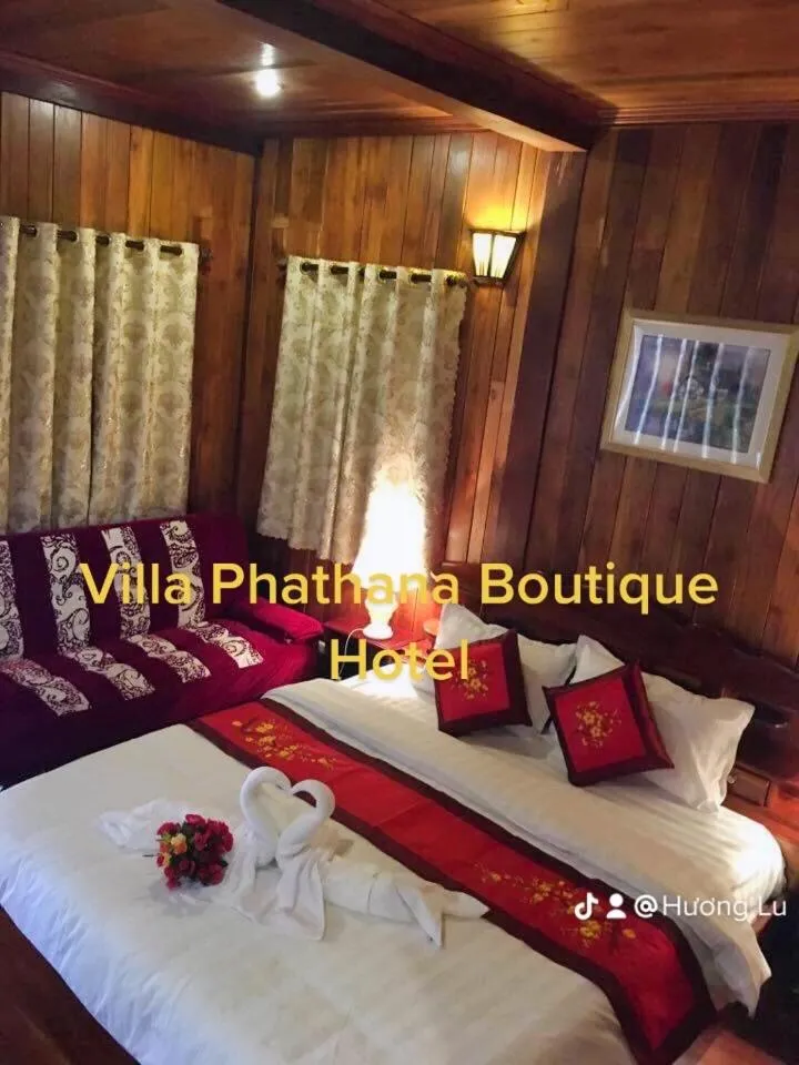Bed in Villa Phathana Boutique Hotel