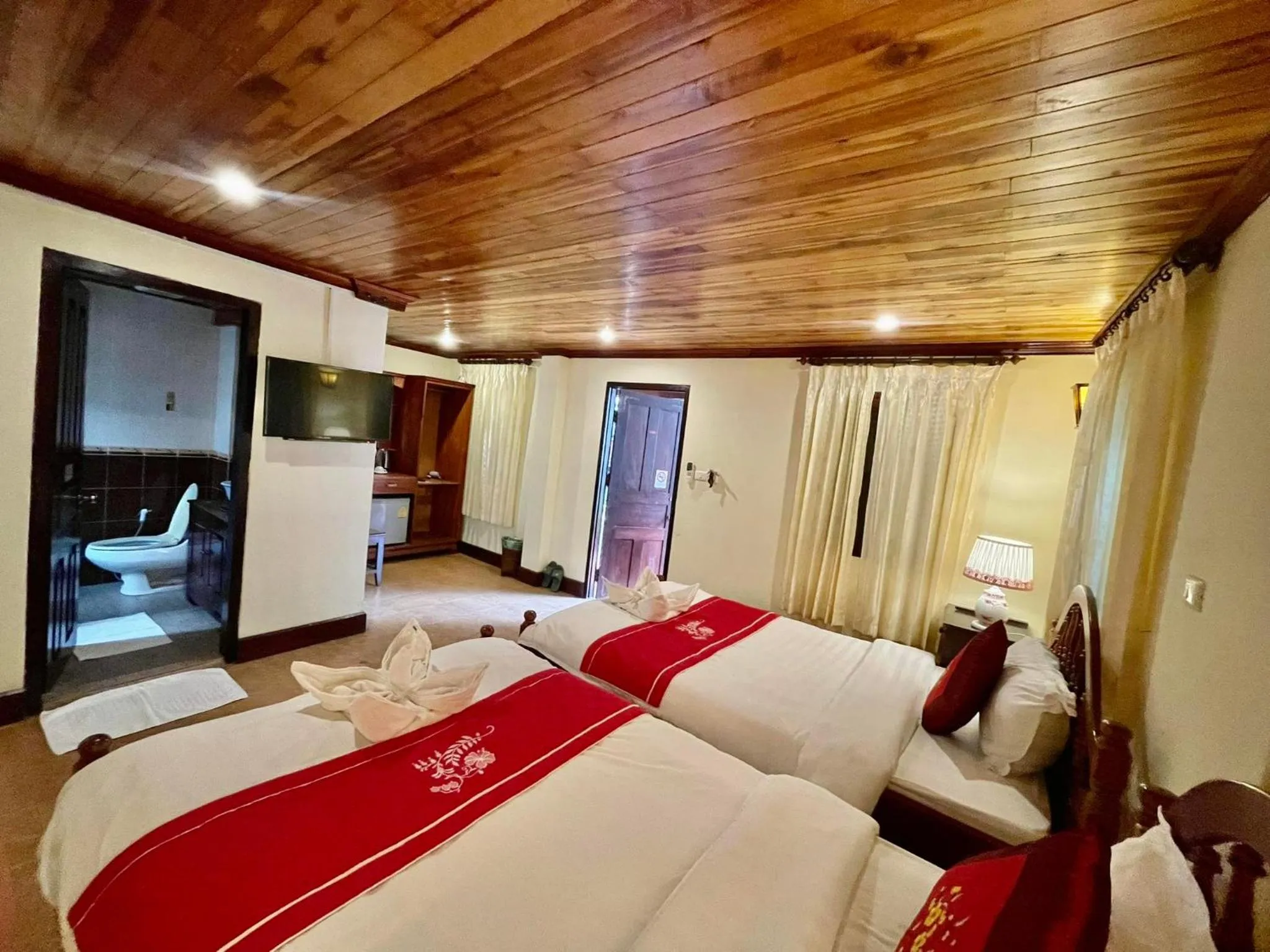 Bed in Villa Phathana Boutique Hotel