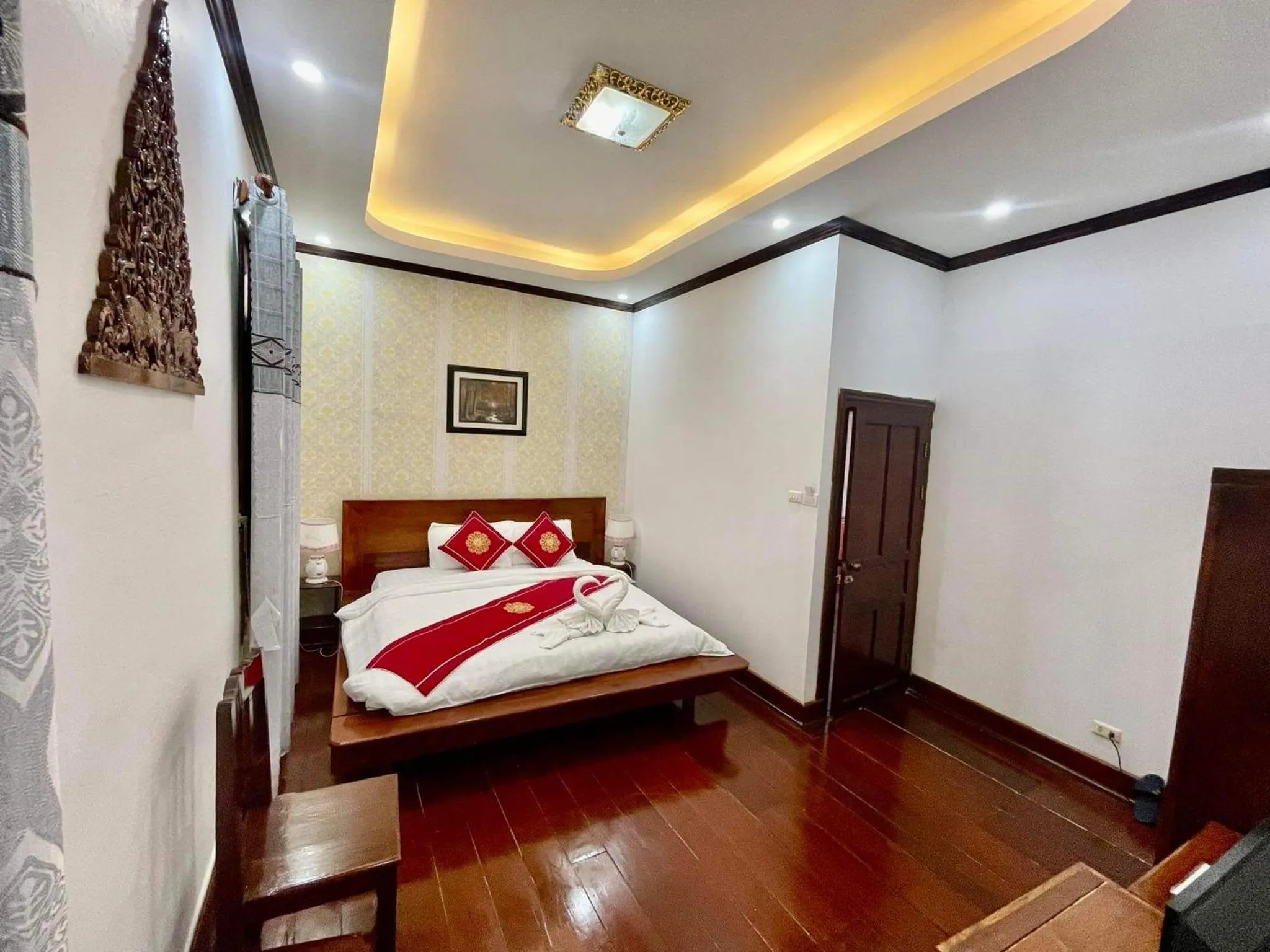 Bed in Villa Phathana Boutique Hotel