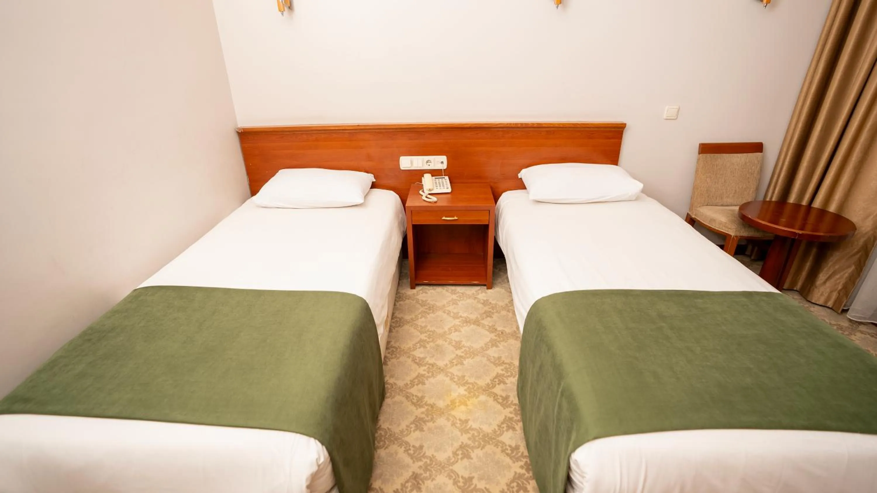 Bed in Golden Siyav Hotel