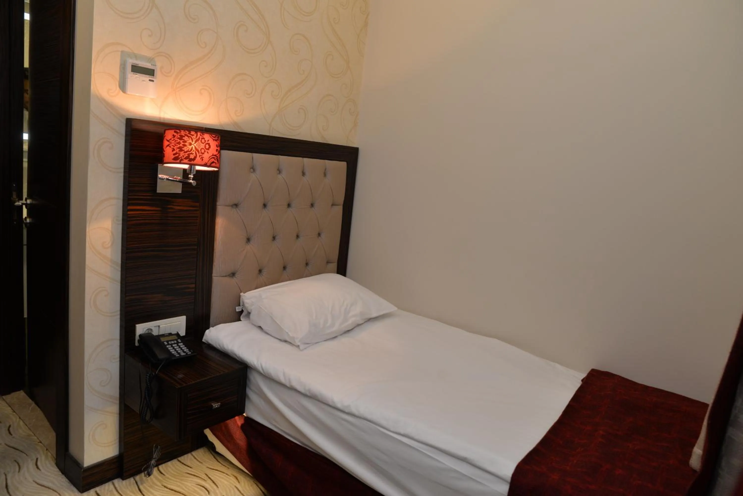 Bed in Golden Siyav Hotel