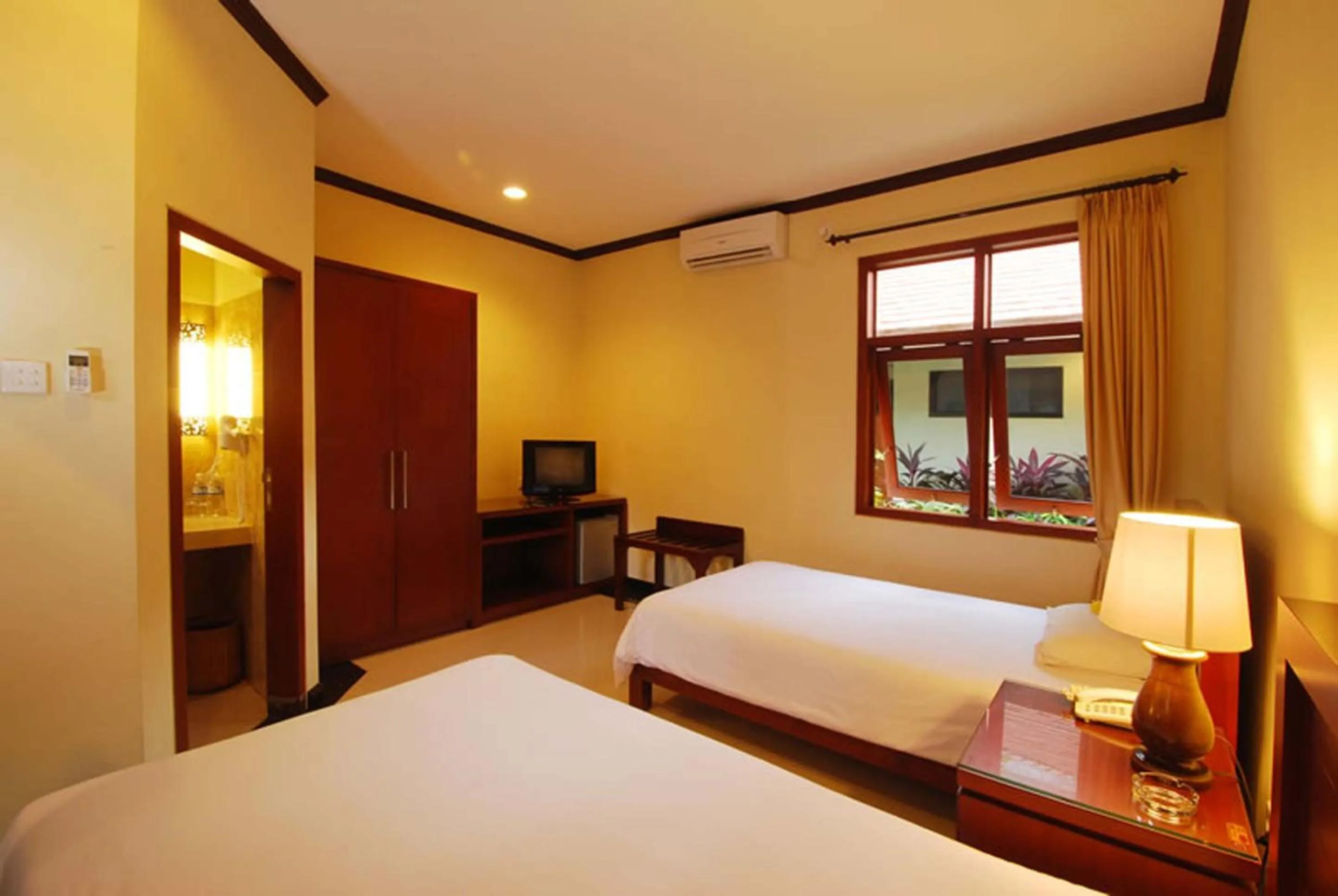 Bedroom, Bed in Yulia Beach Inn Kuta