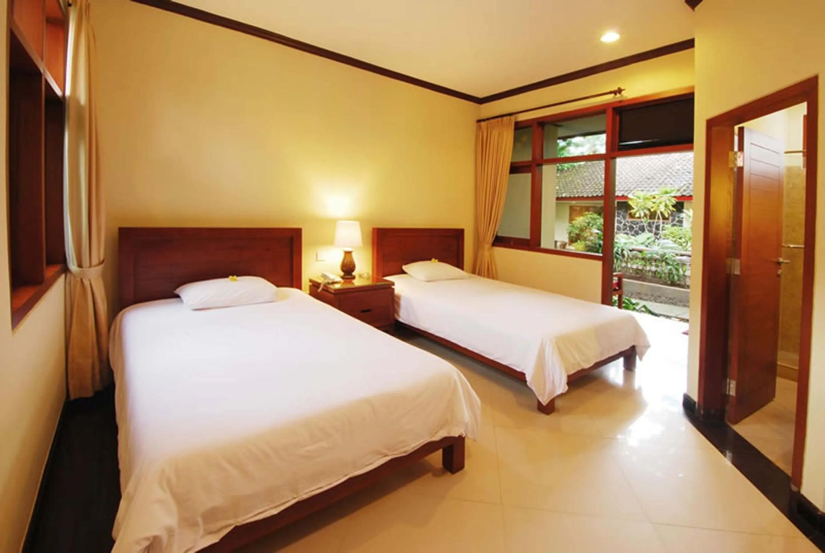 Bedroom, Bed in Yulia Beach Inn Kuta