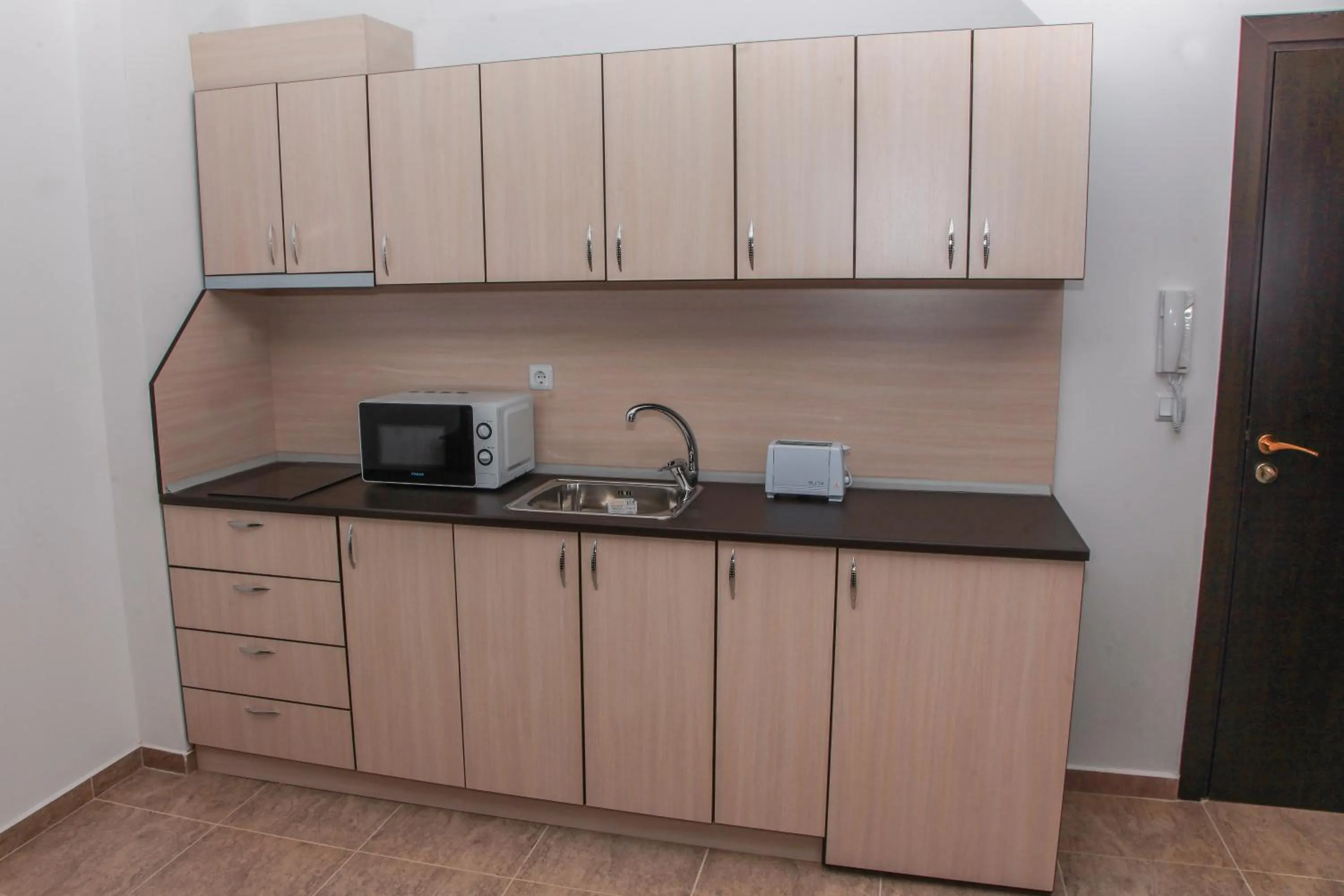 Kitchen or kitchenette in OLYMP Apart-Complex