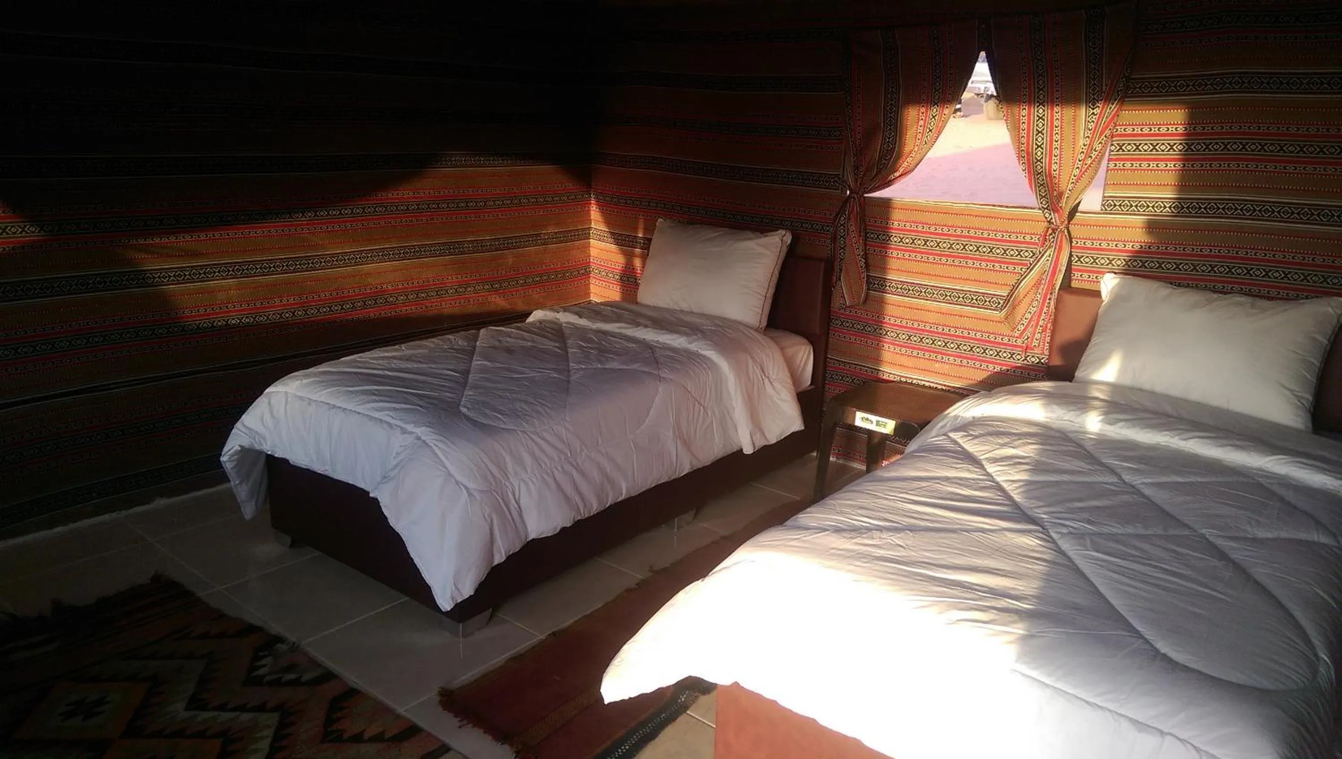 Bed in Beyond Wadi Rum Camp