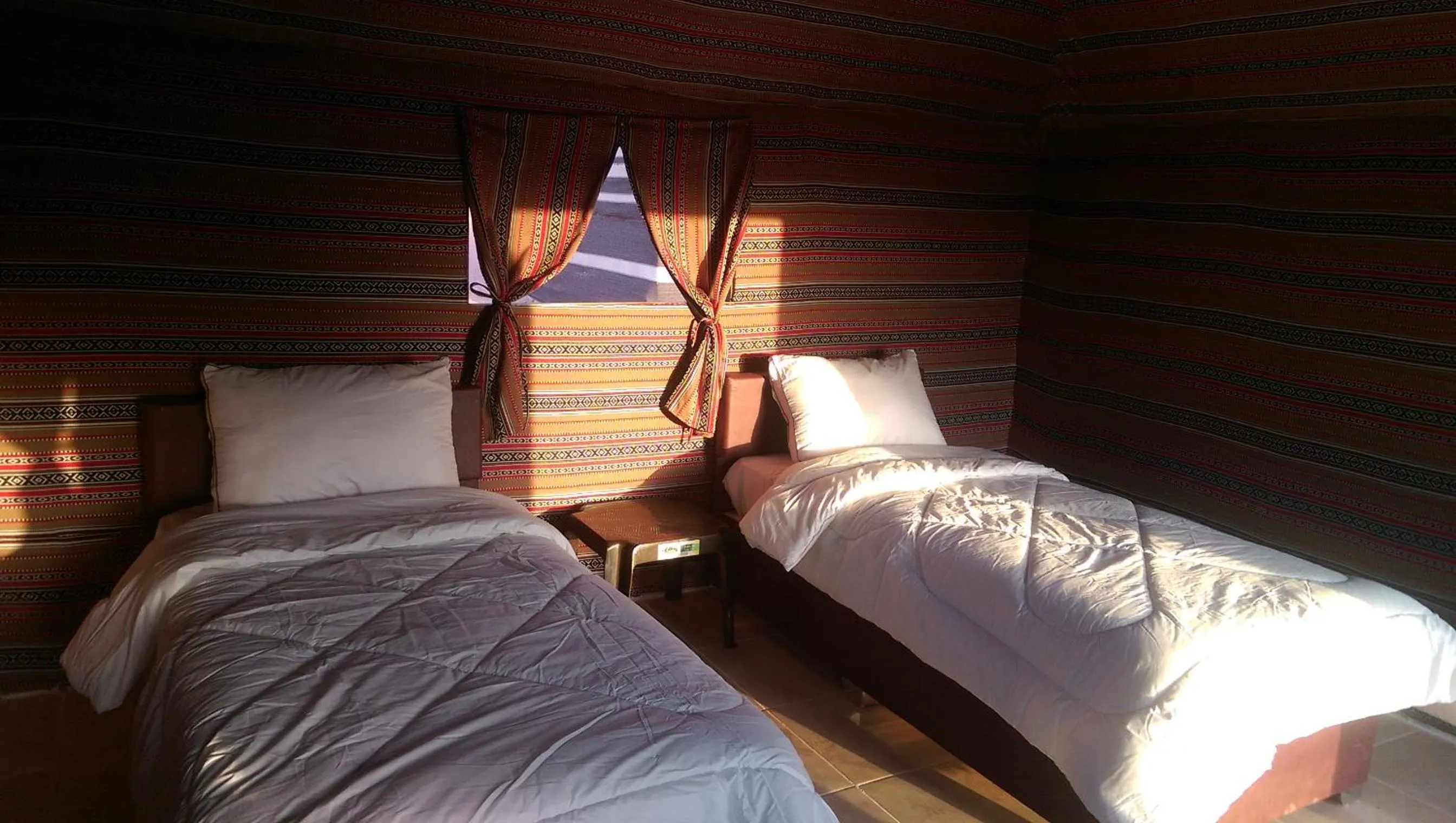 Bed in Beyond Wadi Rum Camp
