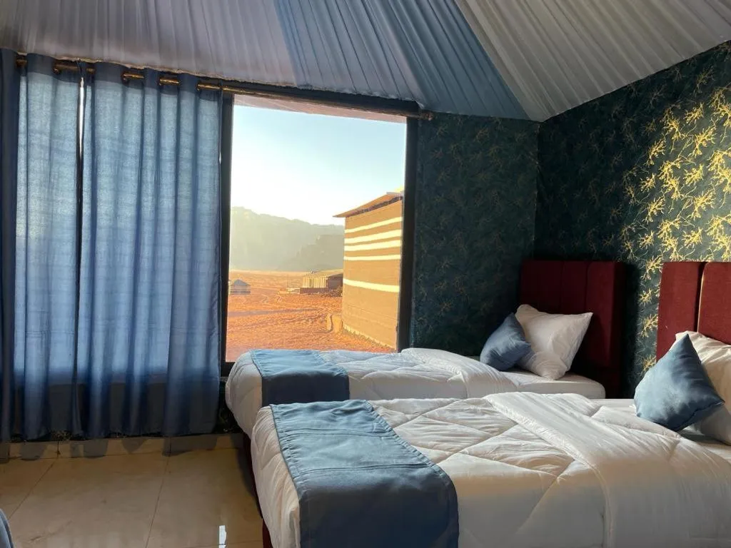 Bed in Beyond Wadi Rum Camp