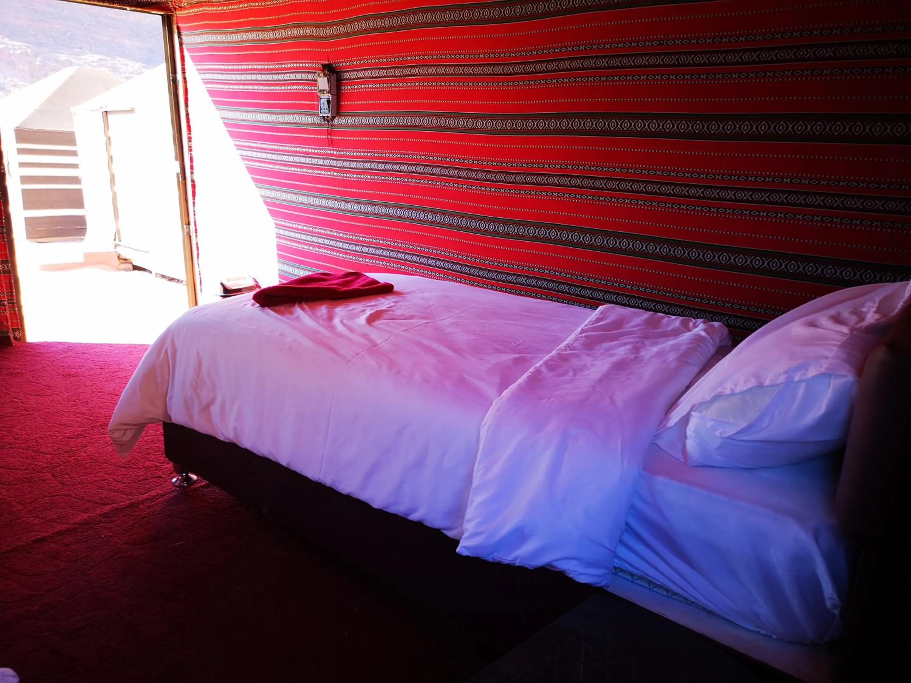 Bed in Beyond Wadi Rum Camp