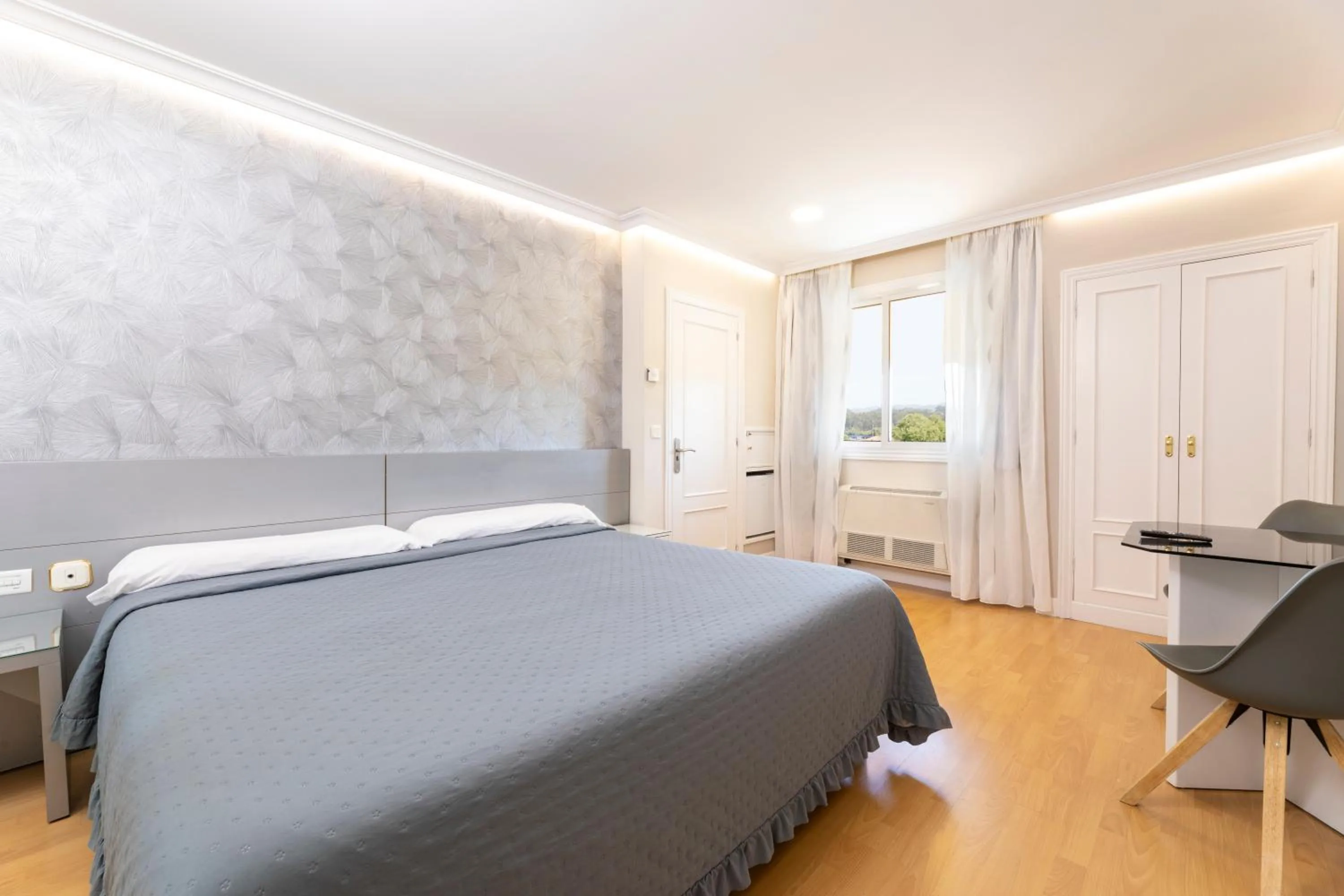 Bed in HOTEL HOLIDAY camino de Santiago por la costa