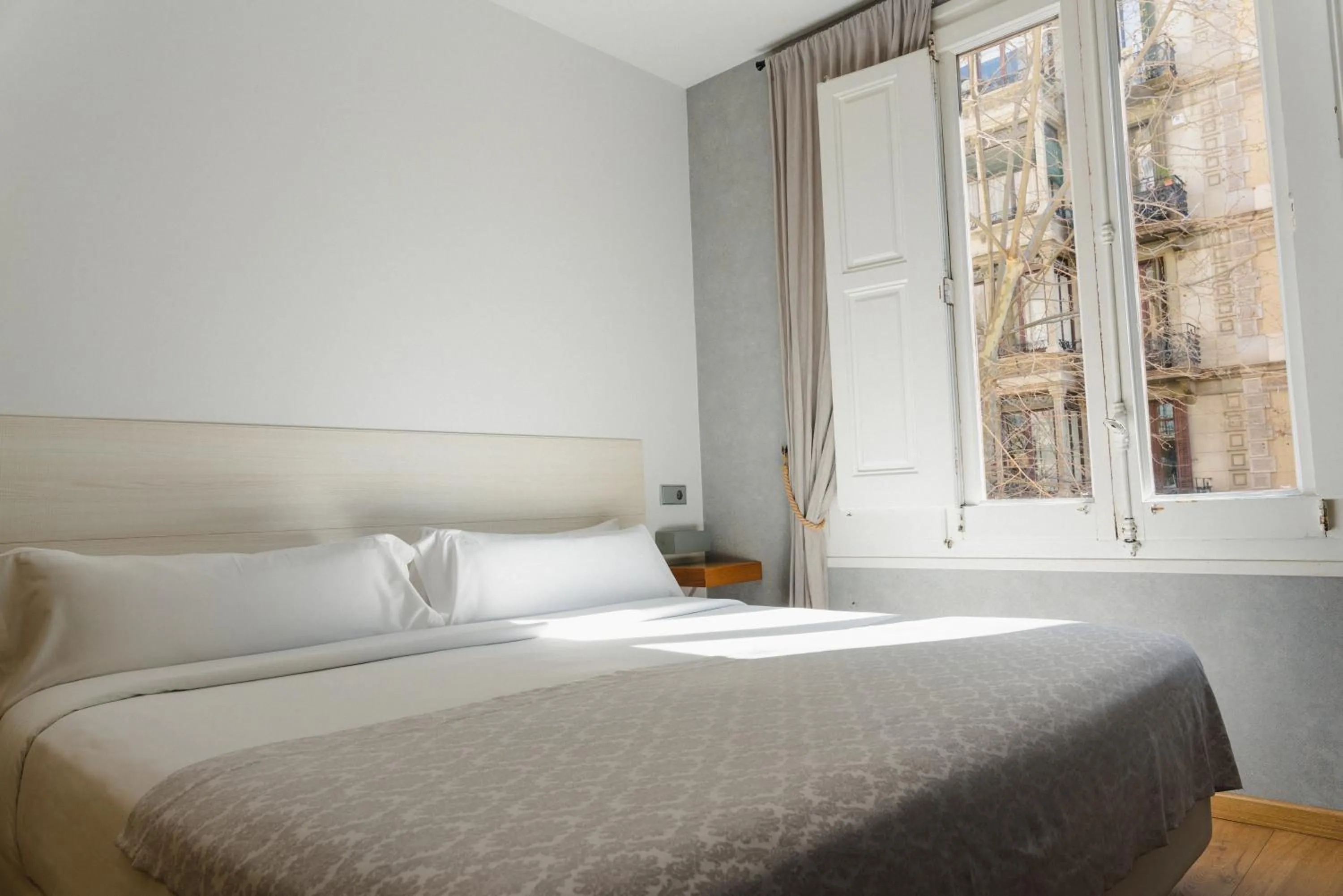 Bed in Cosmopolitan Boutique Rambla