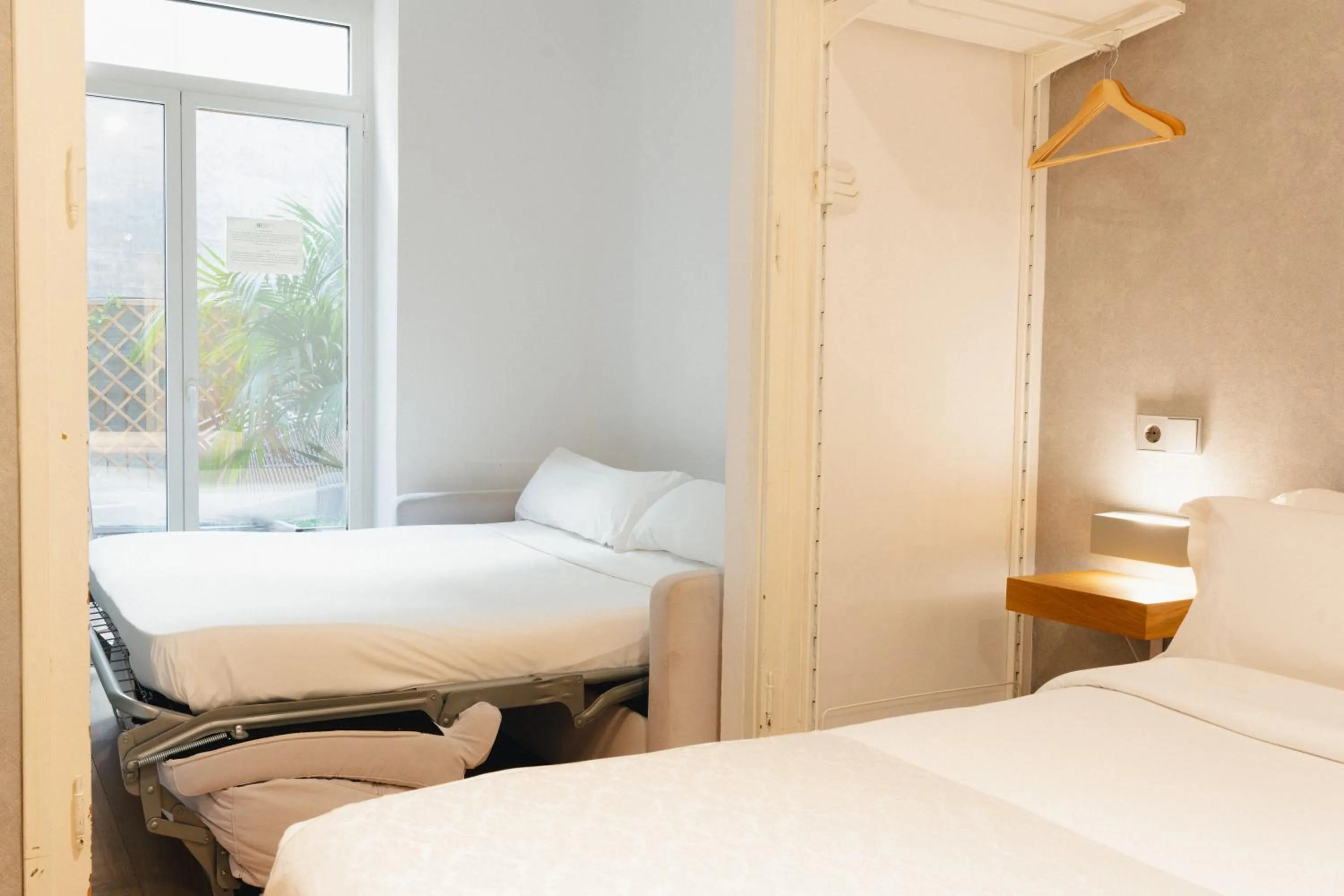 Bed in Cosmopolitan Boutique Rambla