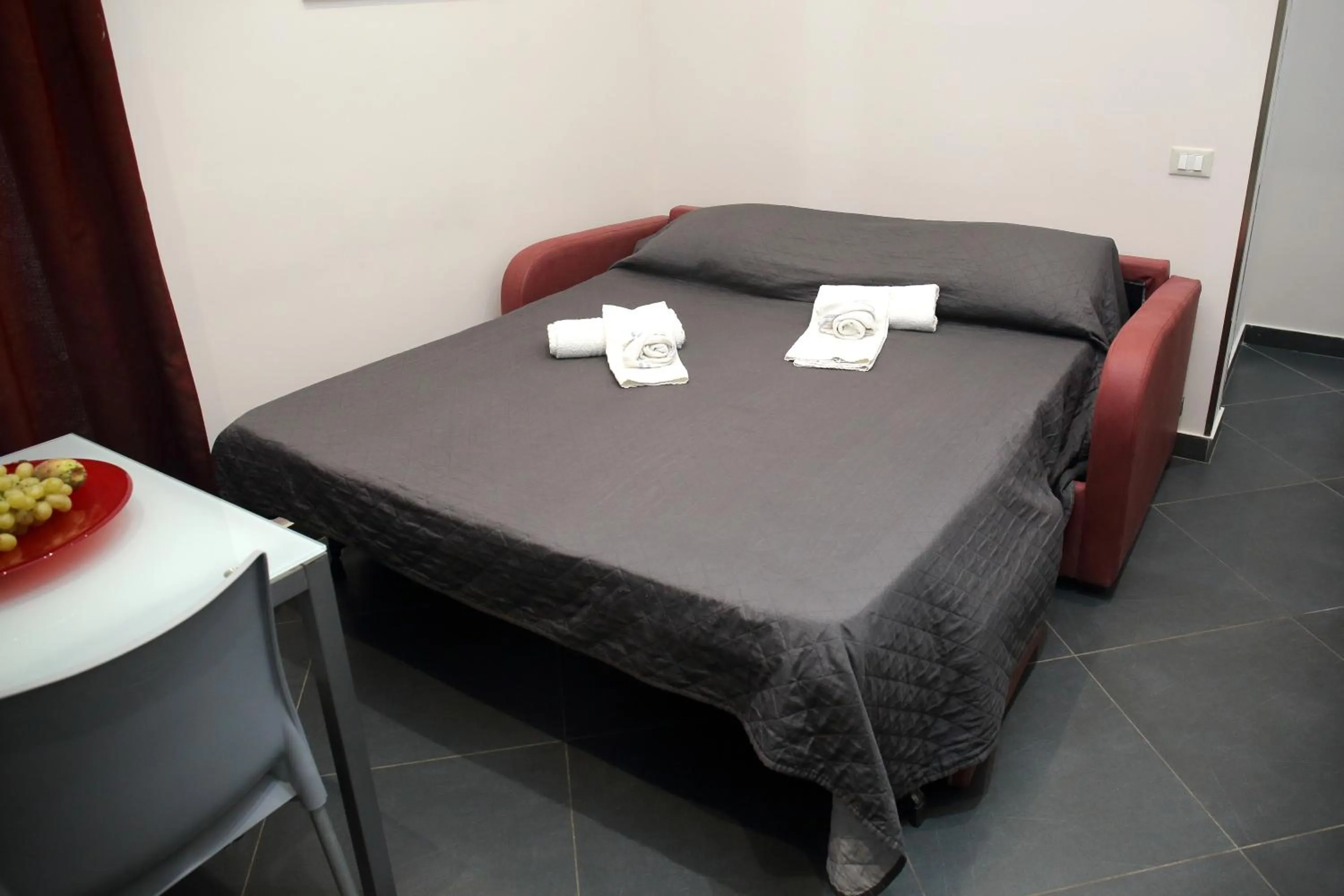 Living room, Bed in Palazzo Dei Corsari