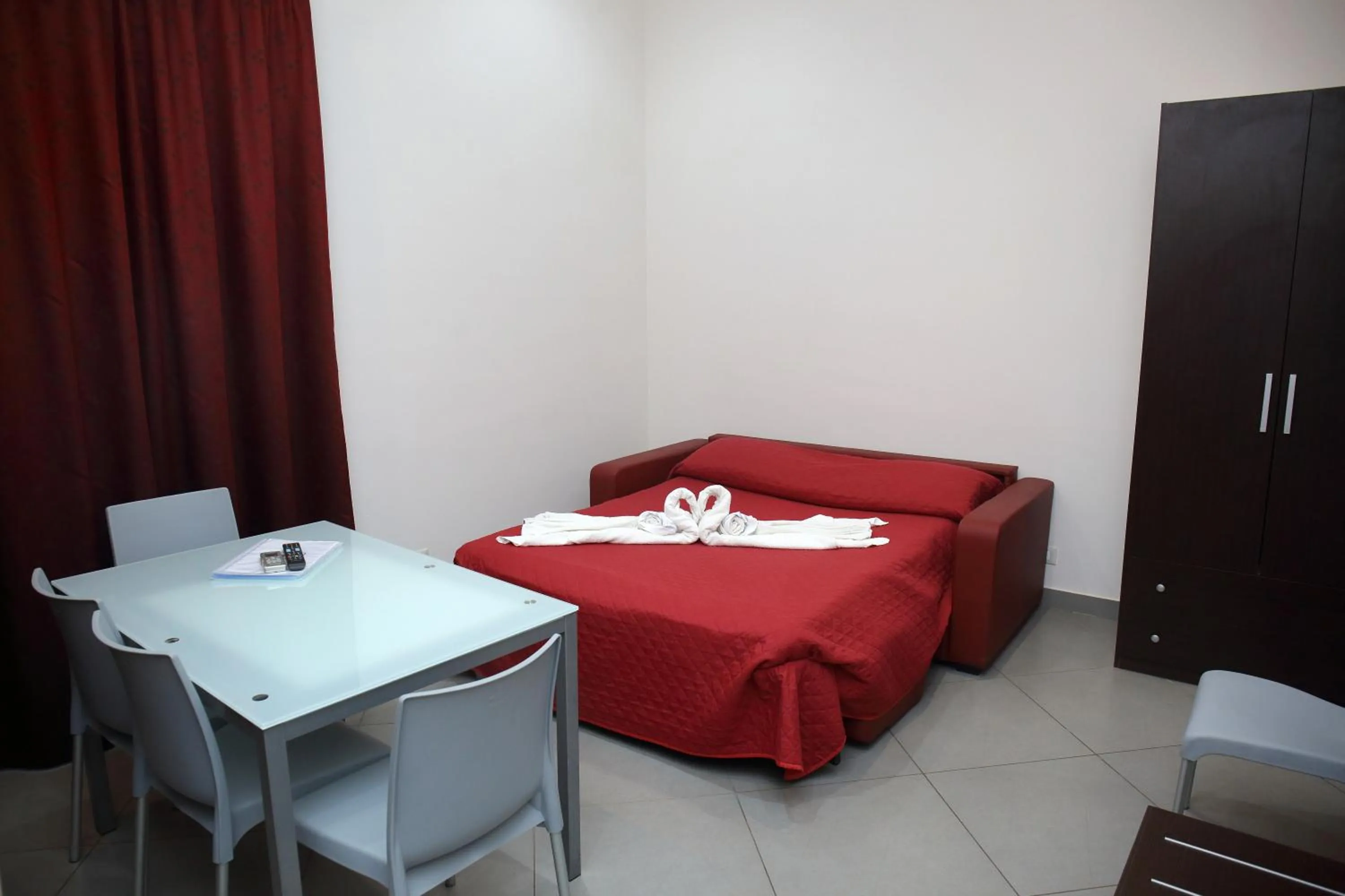 Living room, Bed in Palazzo Dei Corsari