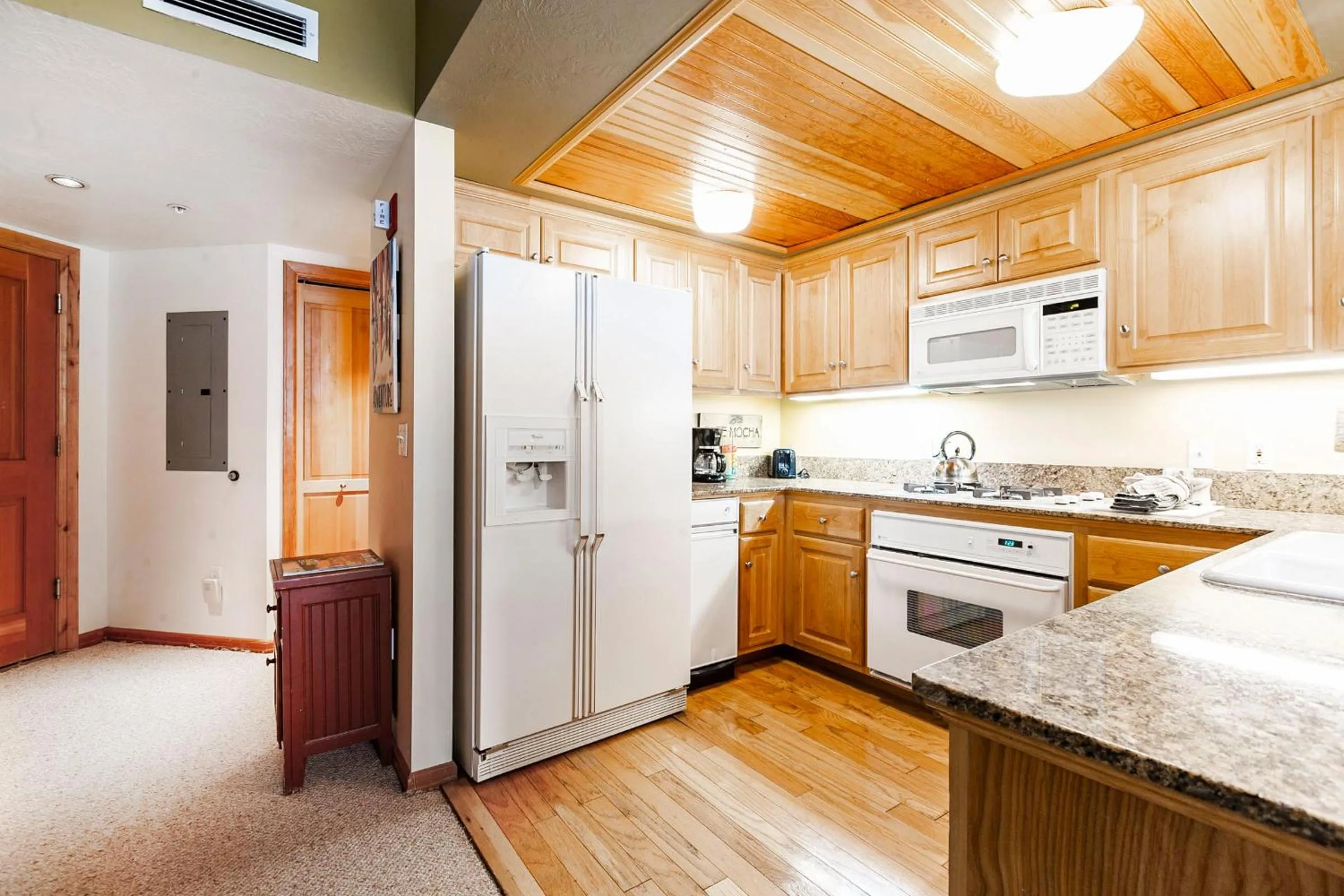 kitchen in The Caledonian by All Seasons Resort Lodging