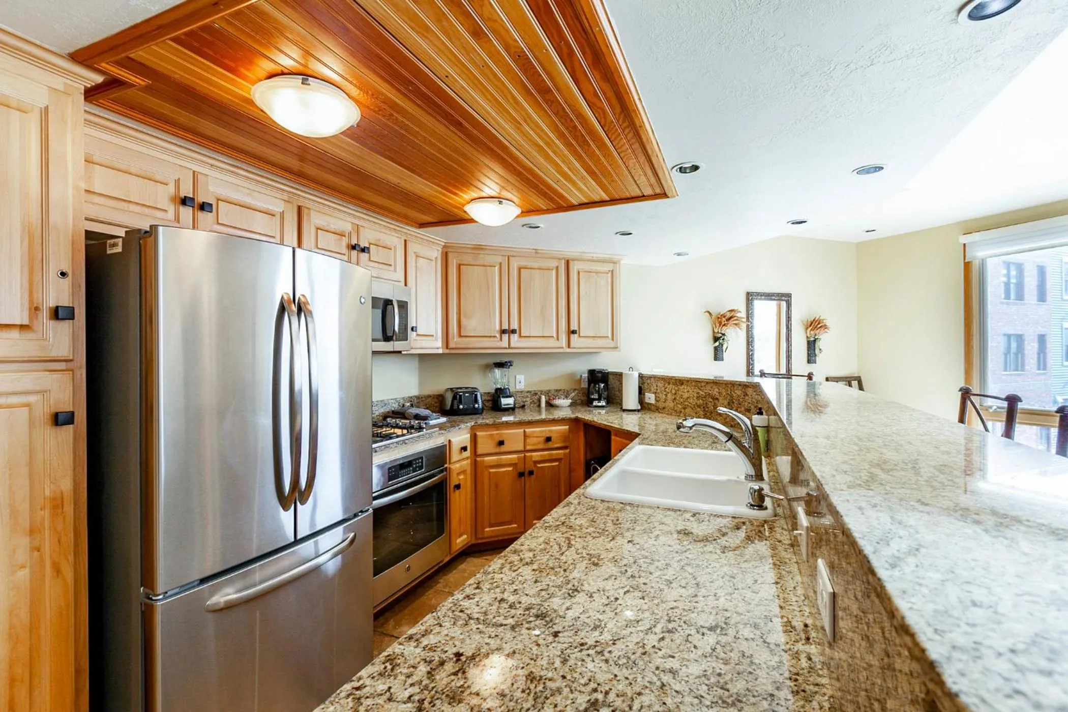 kitchen in The Caledonian by All Seasons Resort Lodging