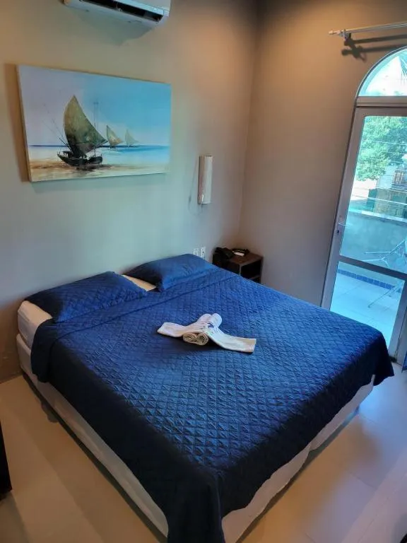 Shower, Bed in Hotel Encontro do Sol