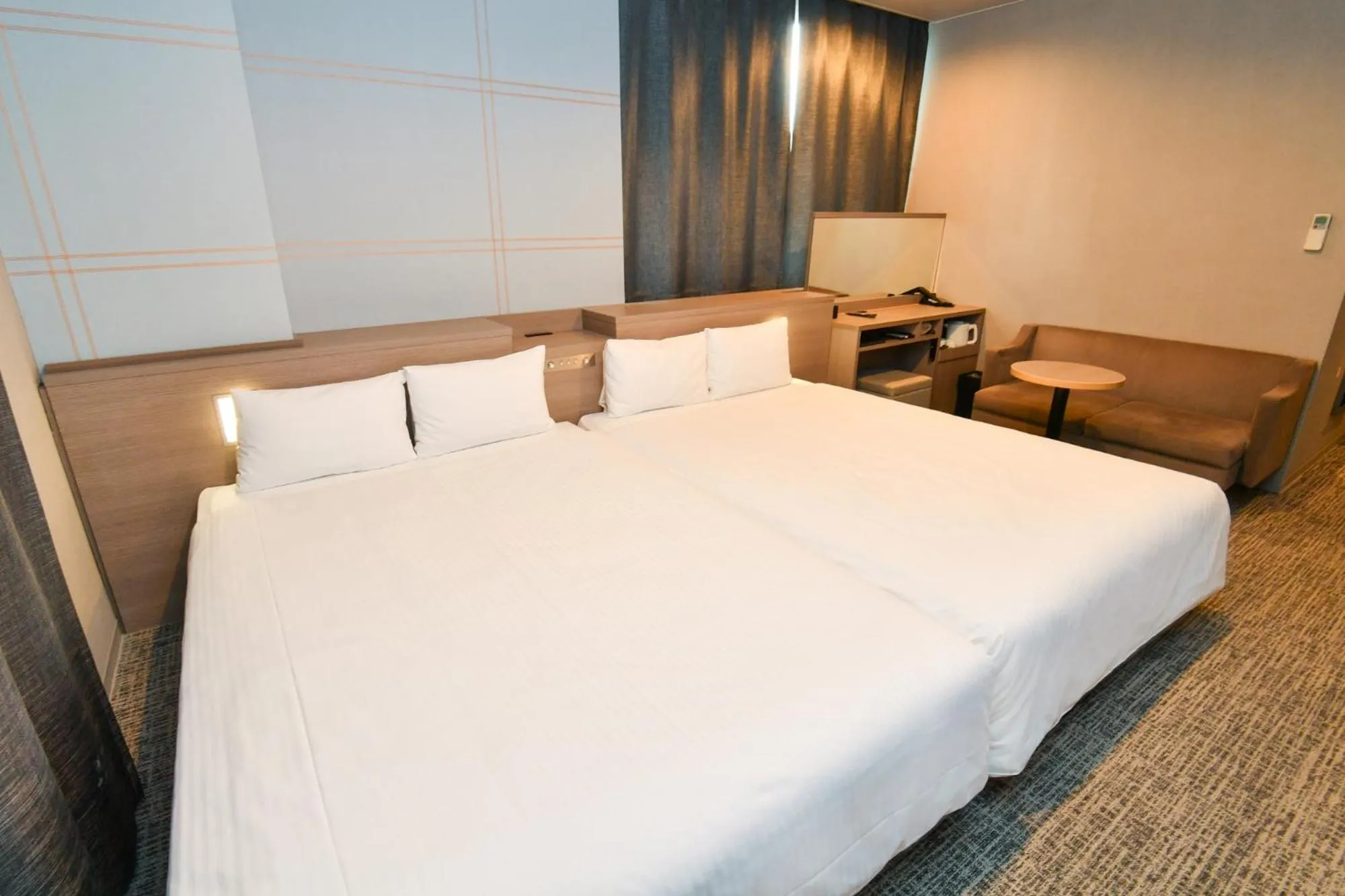 Photo of the whole room, Bed in Sanco Inn Nagoya Shinkansen-guchi Annex
