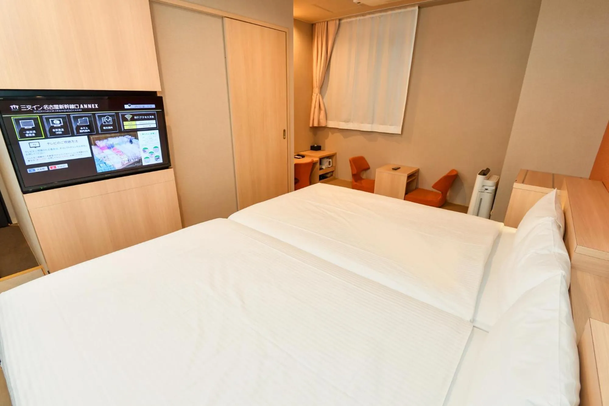 Photo of the whole room, Bed in Sanco Inn Nagoya Shinkansen-guchi Annex