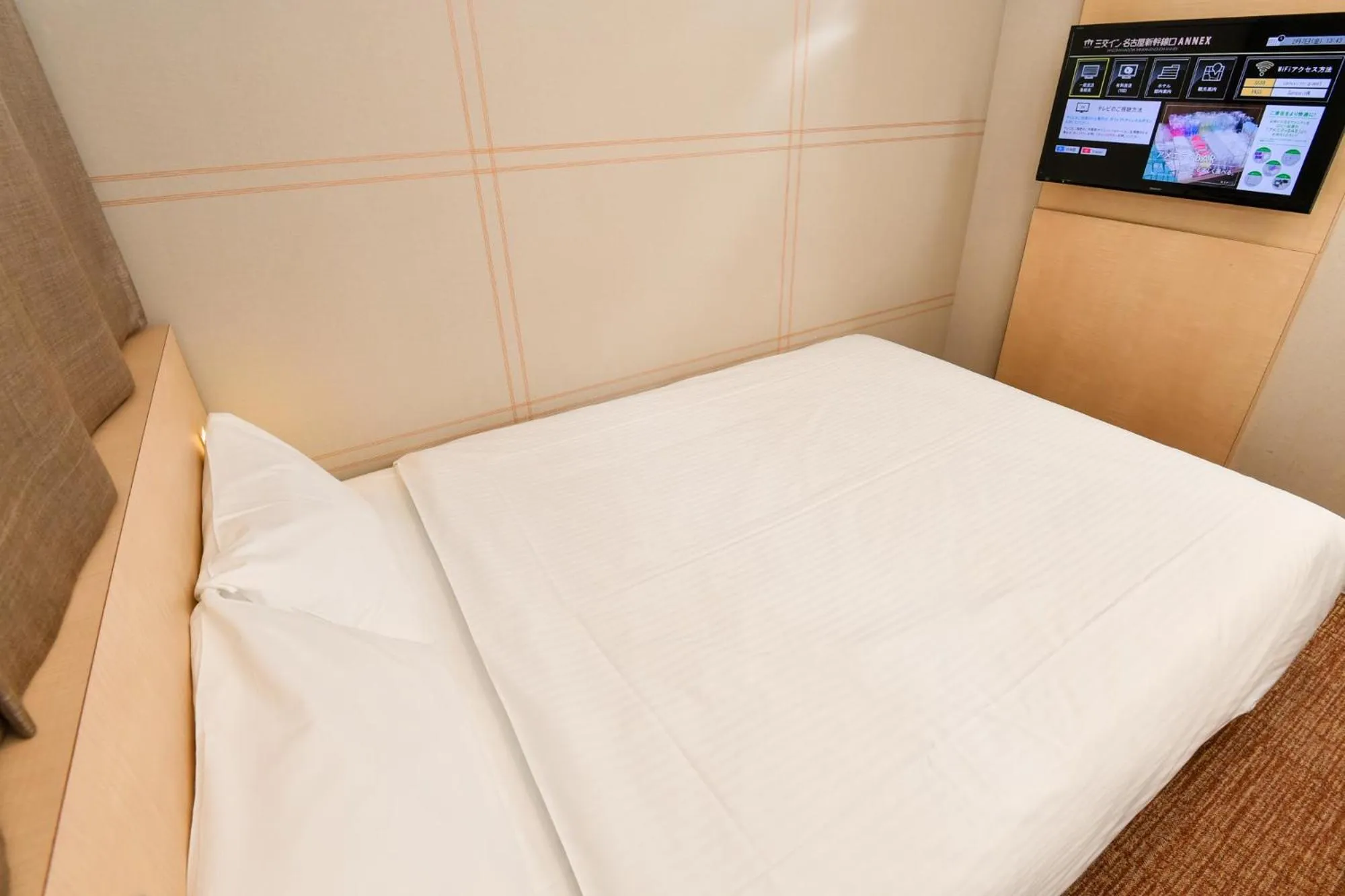 Photo of the whole room, Bed in Sanco Inn Nagoya Shinkansen-guchi Annex