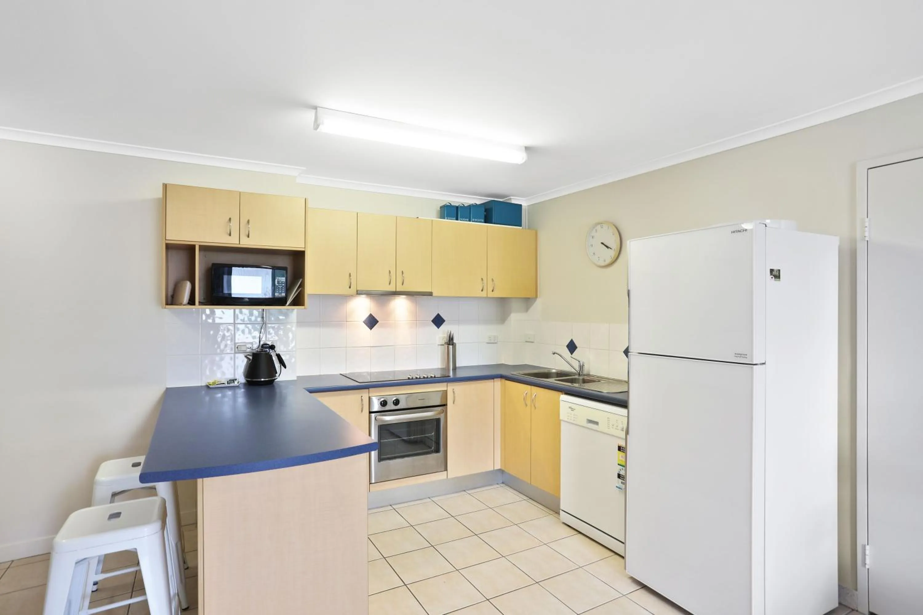 kitchen in Headland Gardens Holiday Apartments