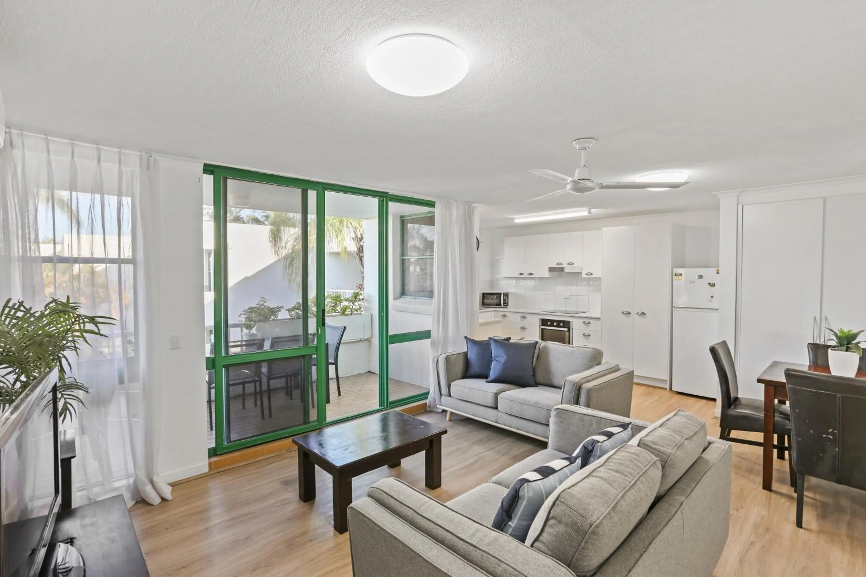Living room in Headland Gardens Holiday Apartments
