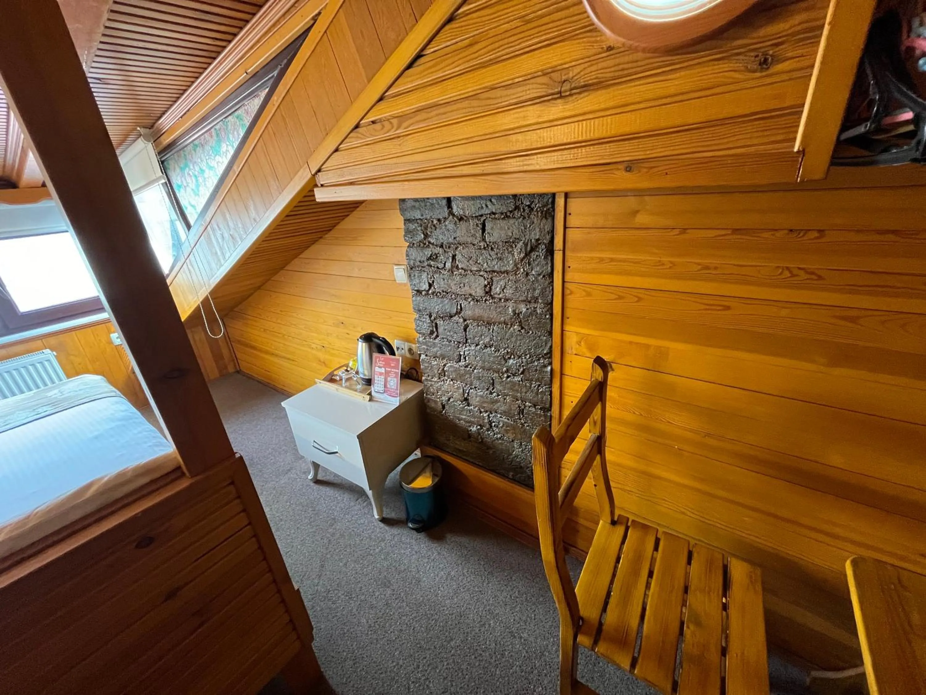 Bed in Le Safran Suite Hotel