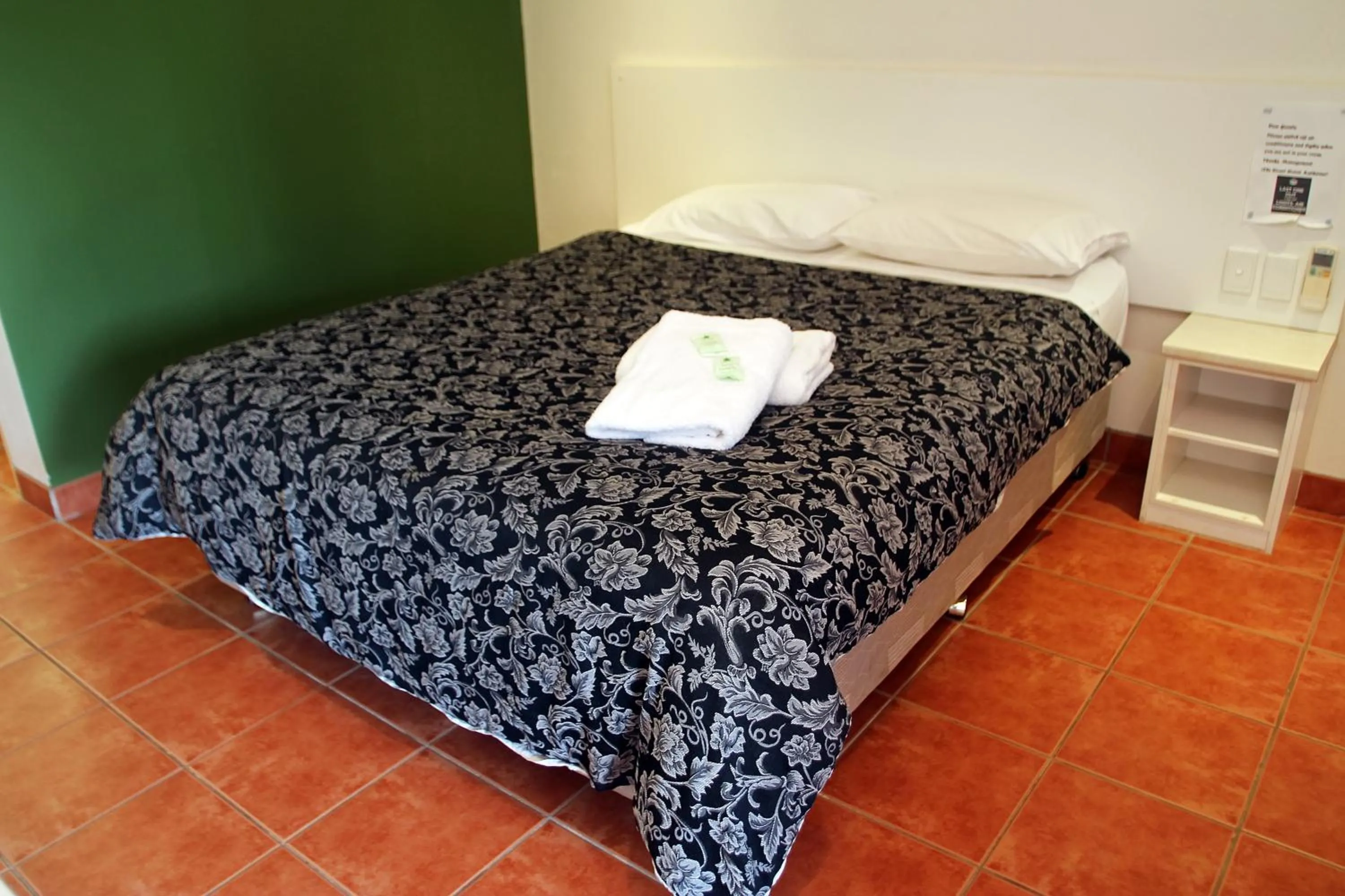 Bedroom, Bed in The Stuart Hotel-Motel