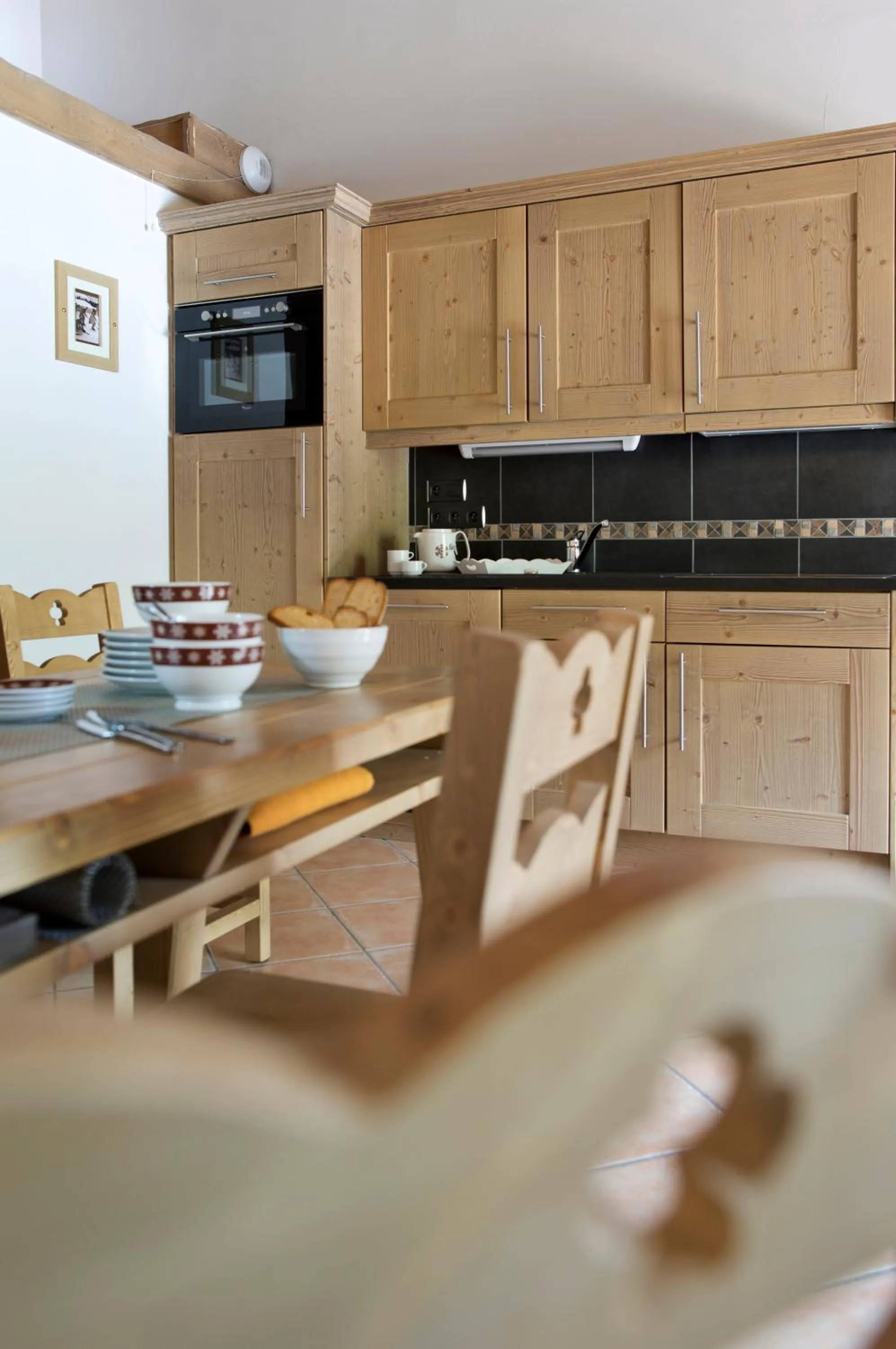 Kitchen or kitchenette in CGH Résidences & Spas Le Télémark